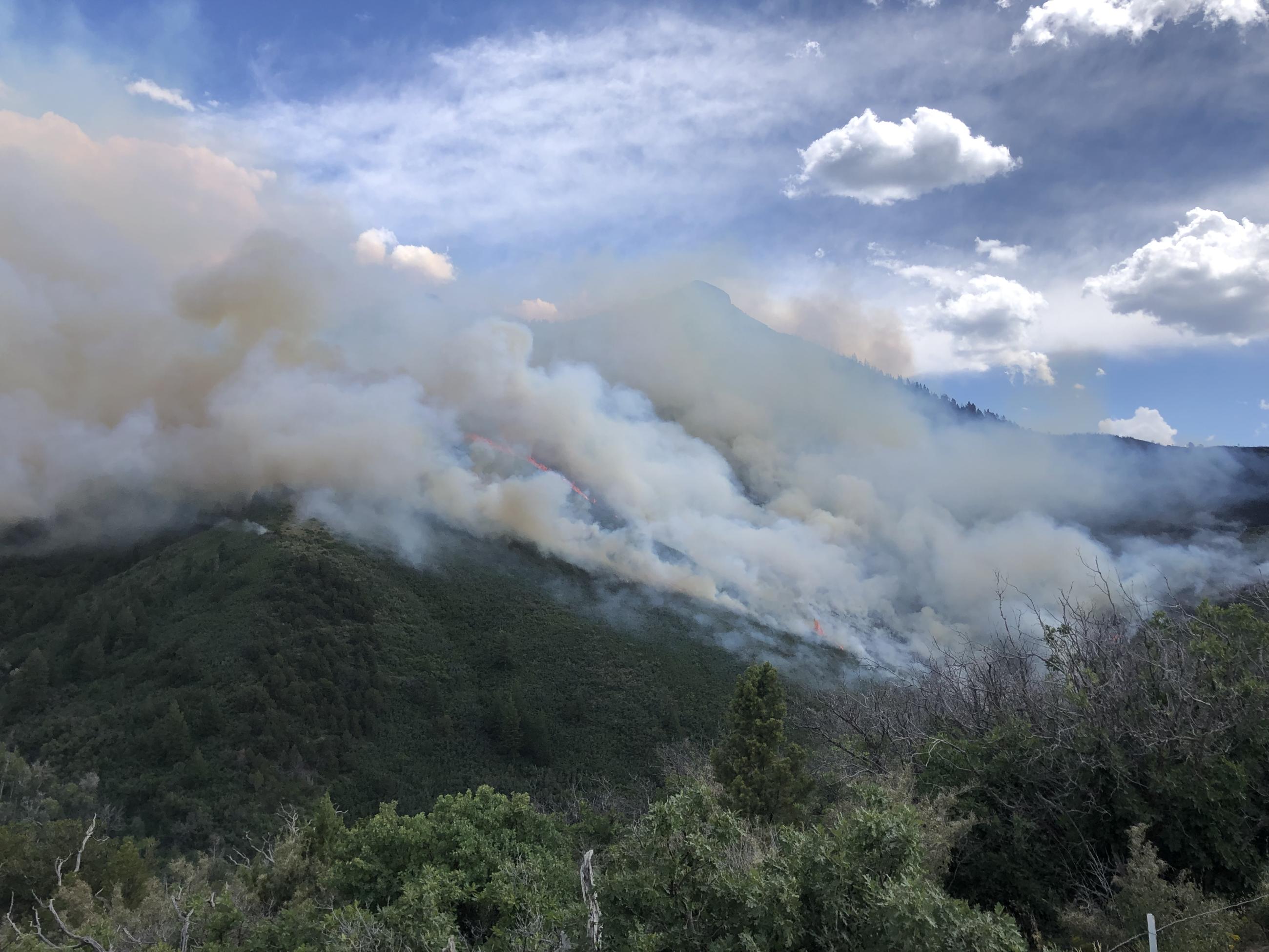 fire and smoke on a mountain July 6