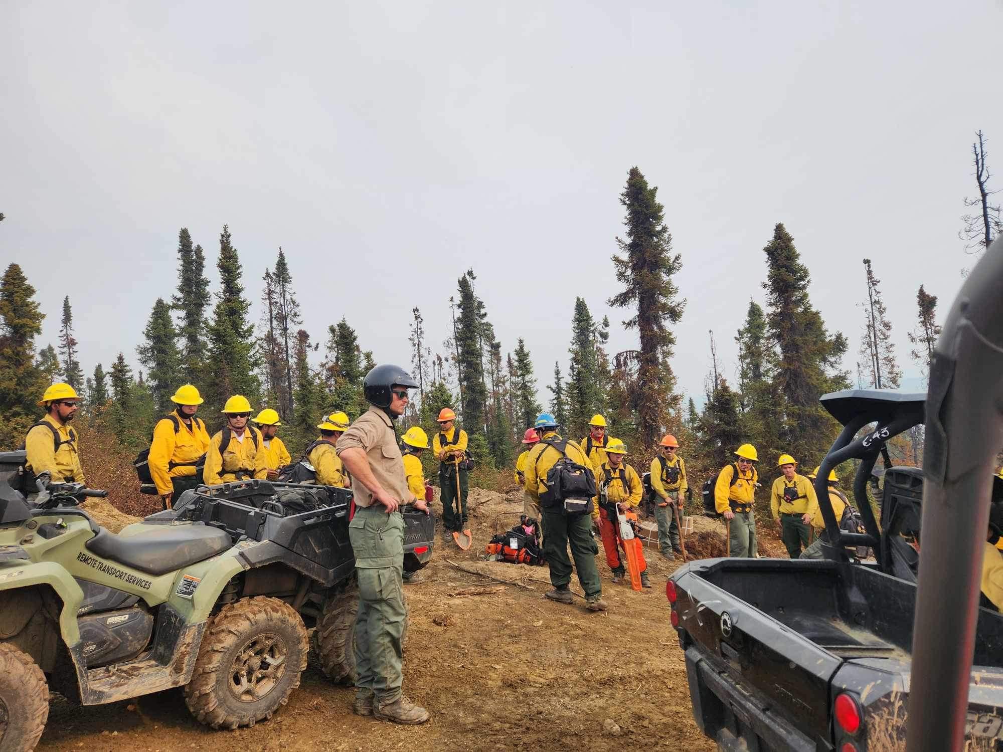 Firefighting crew getting their gear together.