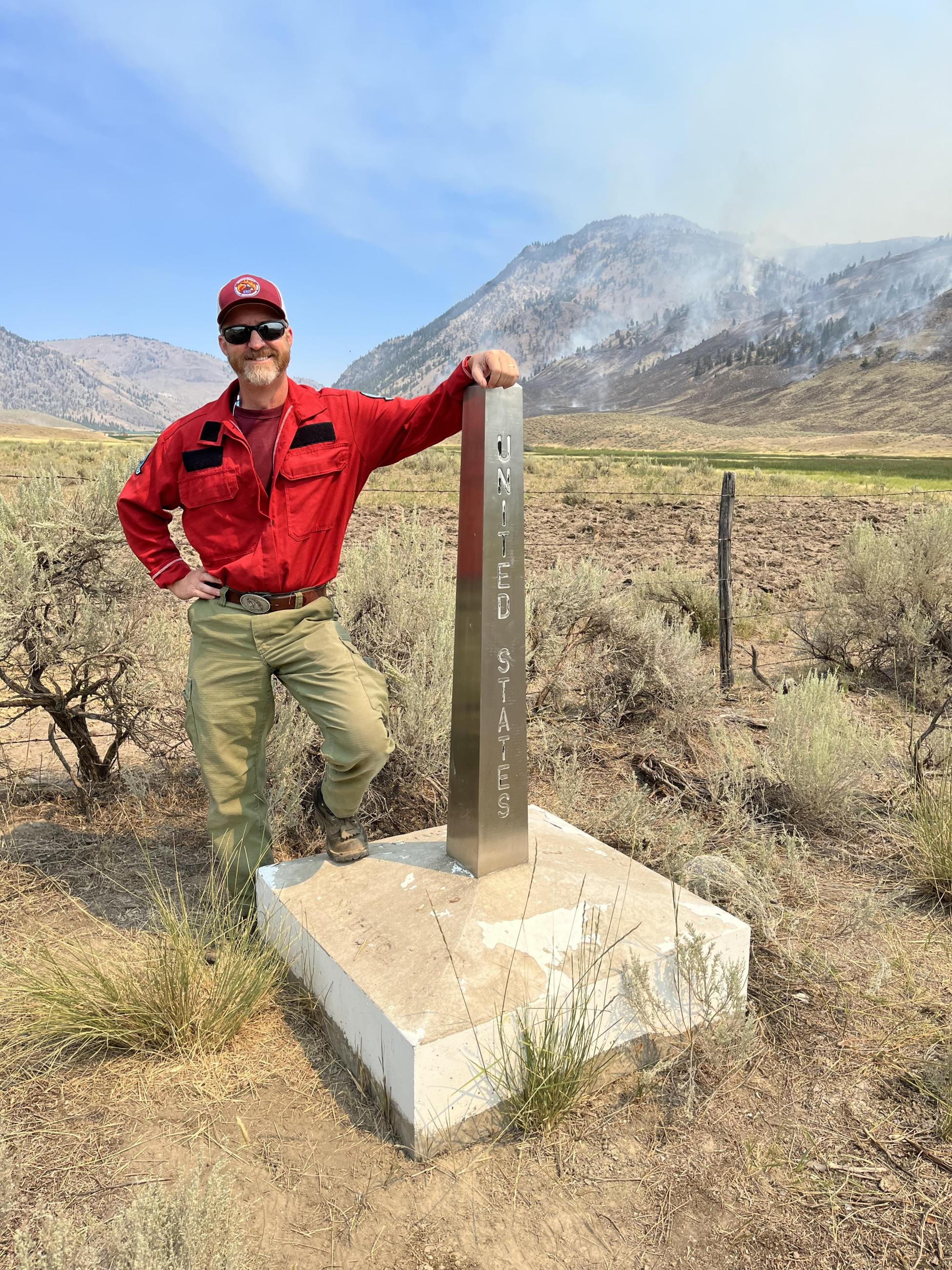 NW Team 7 Operations Chief Chris Orr standing on the US-Canadian border