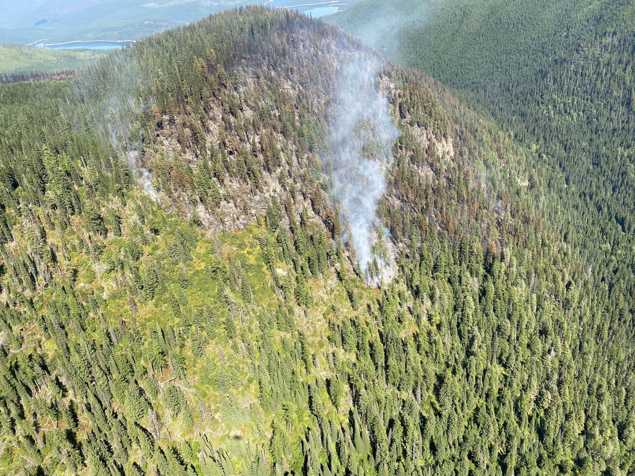 Ridge Fire burn scar with smoke