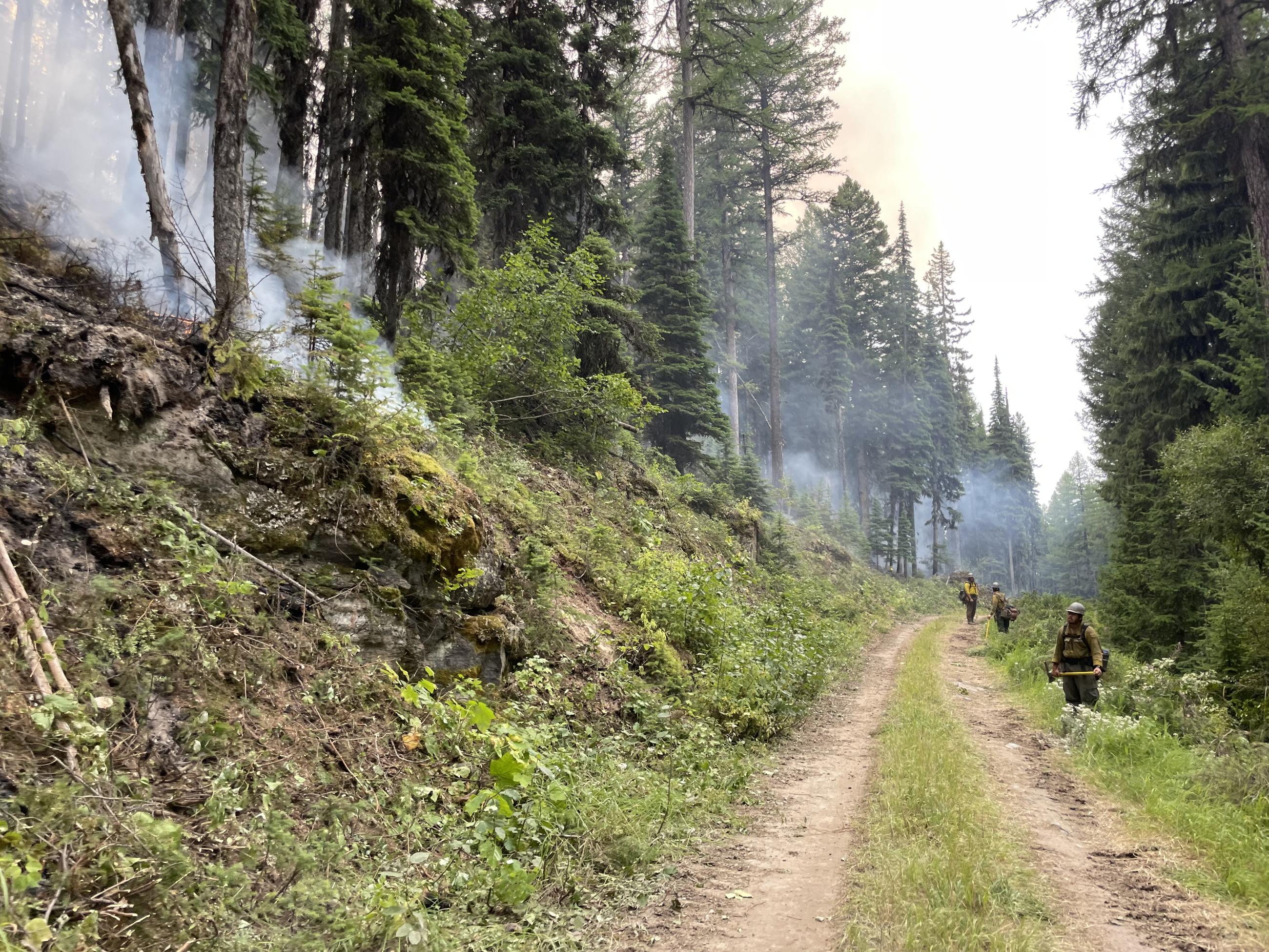 Crew watches fire backing down toward the 3707 Road