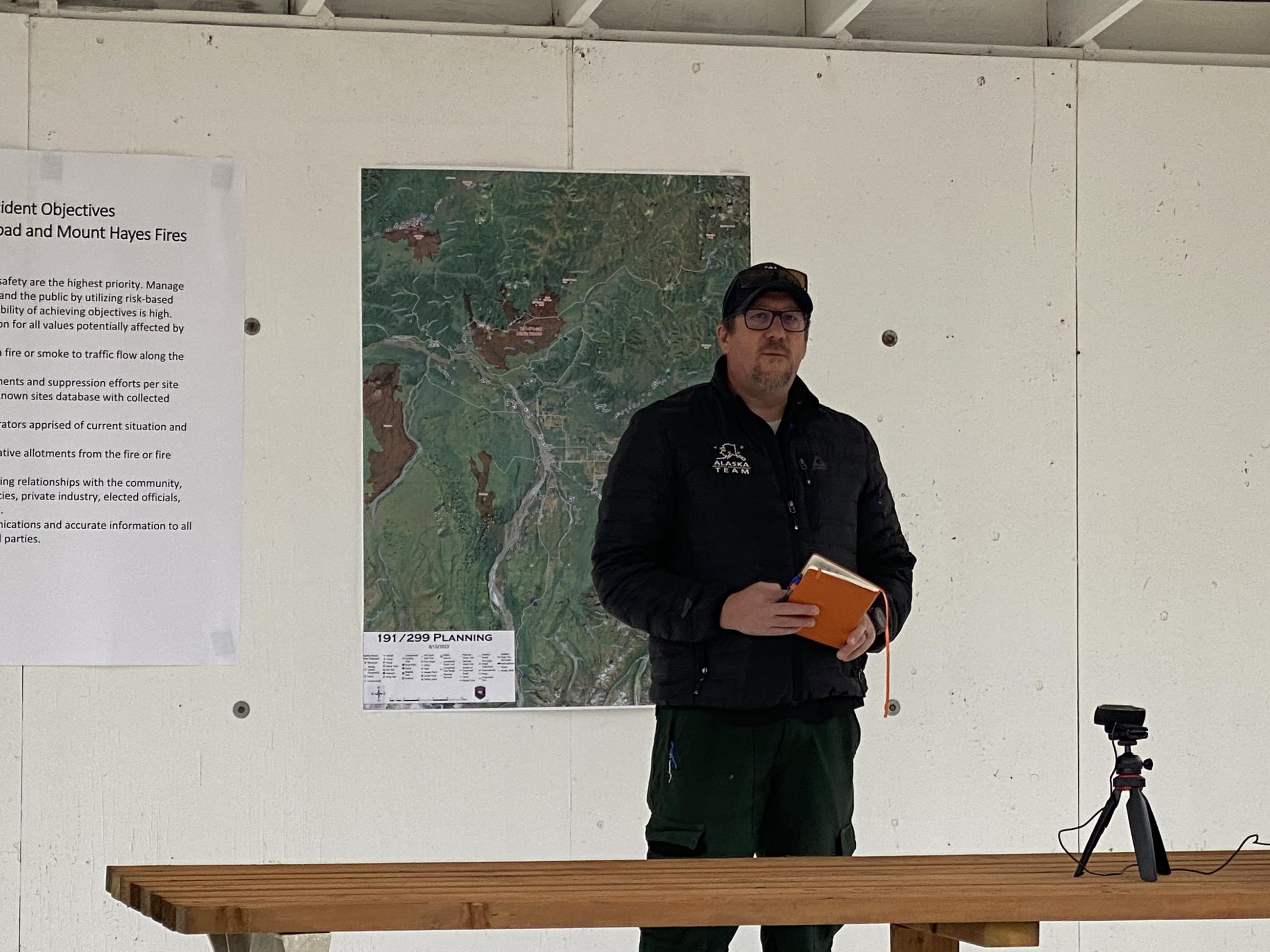 Type 3 Incident commander Casey Boesfplug addressing resources arriving to support suppression efforts on Pogo Mine Road Fire #191 and Mount Hayes Fire #299.