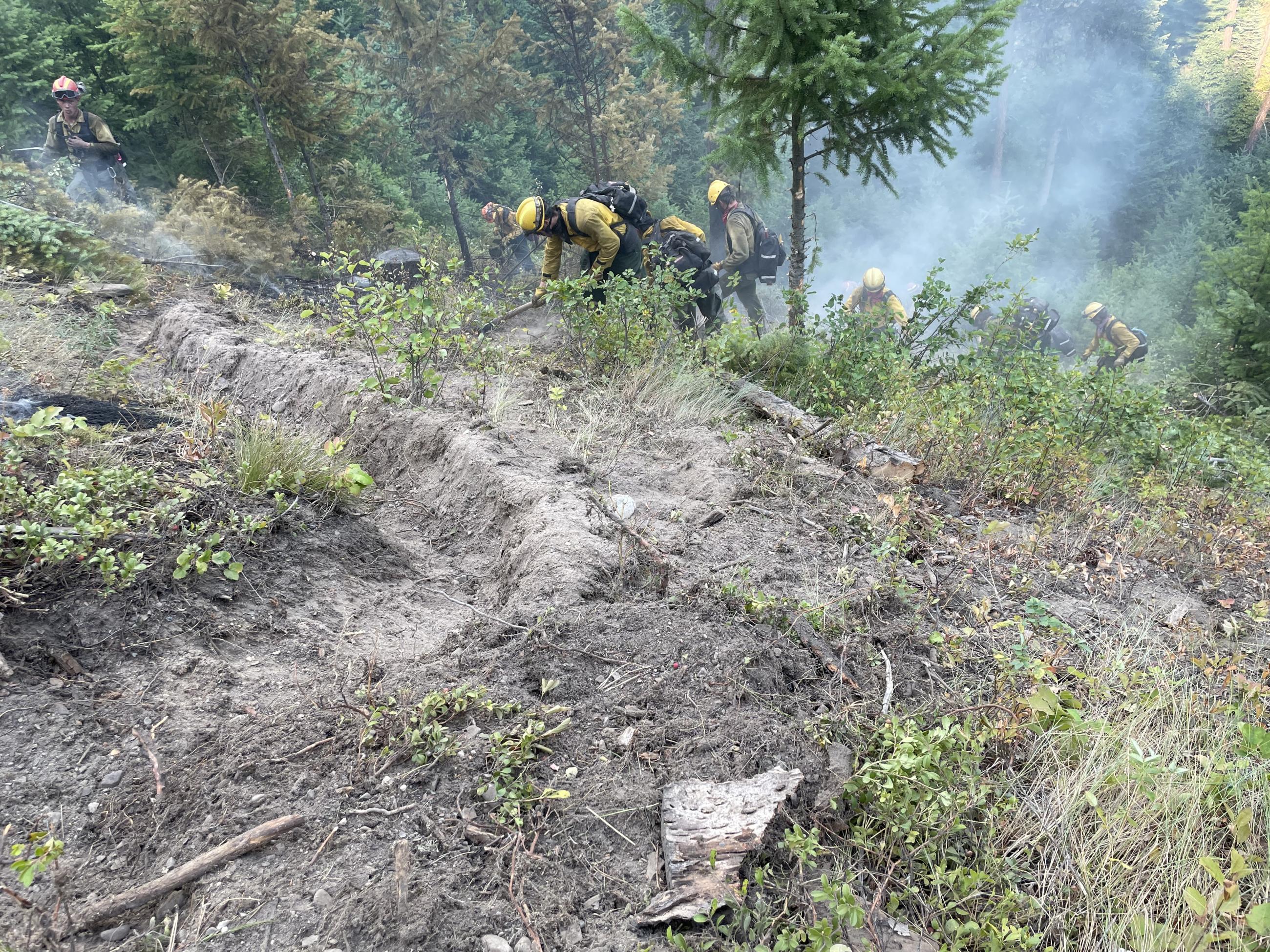 Firefighters constructing handline on Gravel Pit Fire.