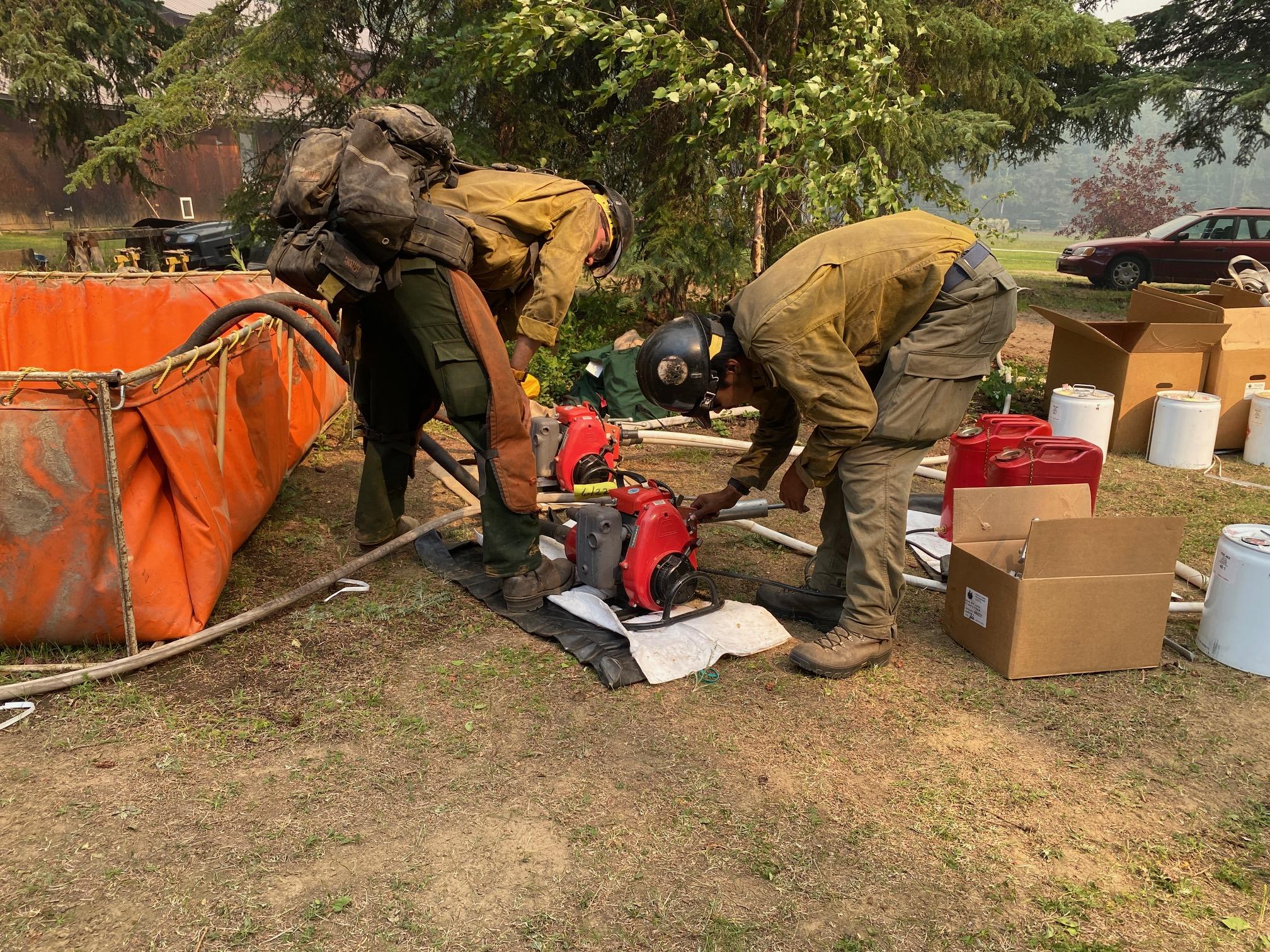 TCC crew members start a Mark III pump