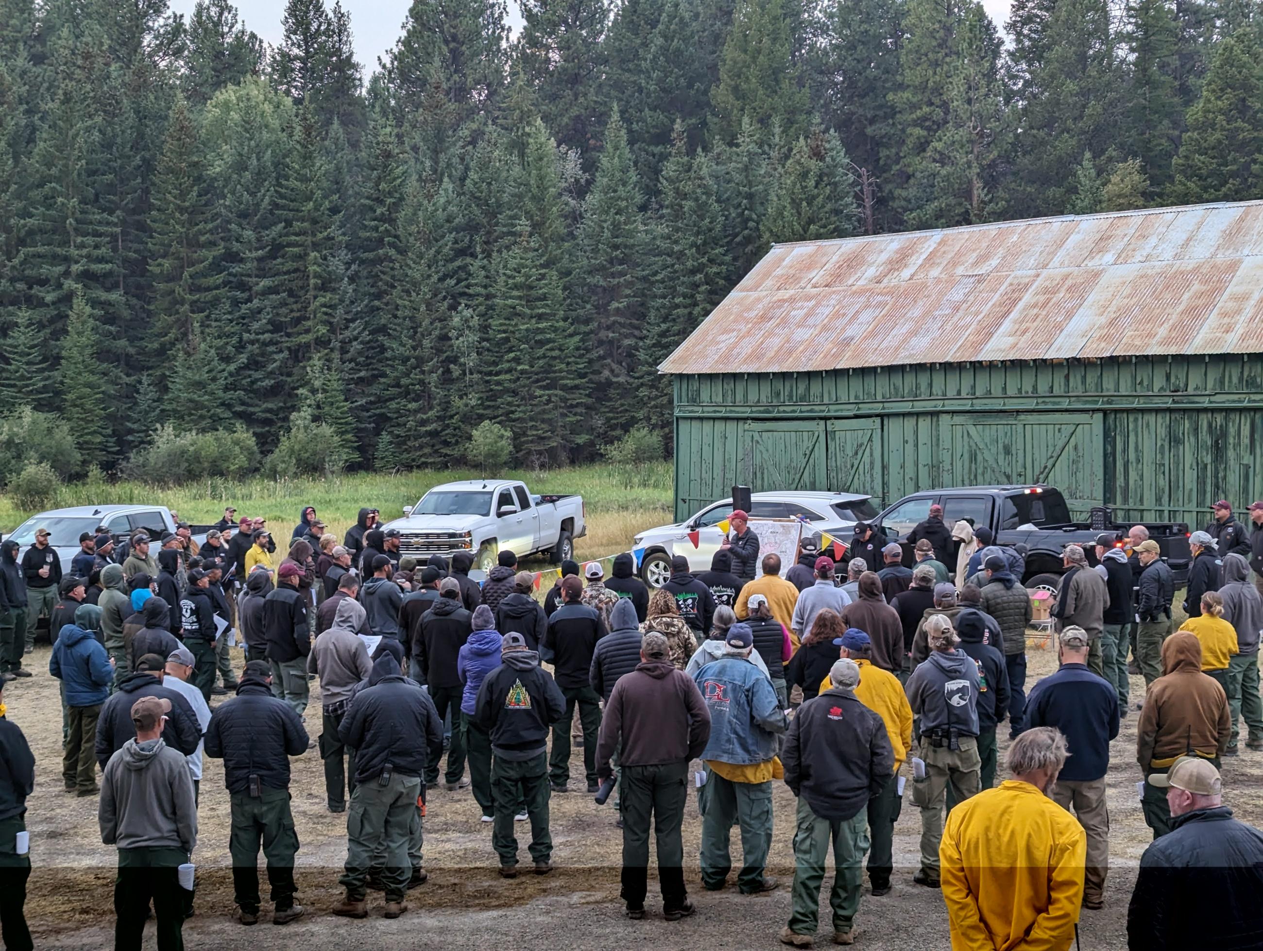 East Fork Fire morning briefing listening to incident commander