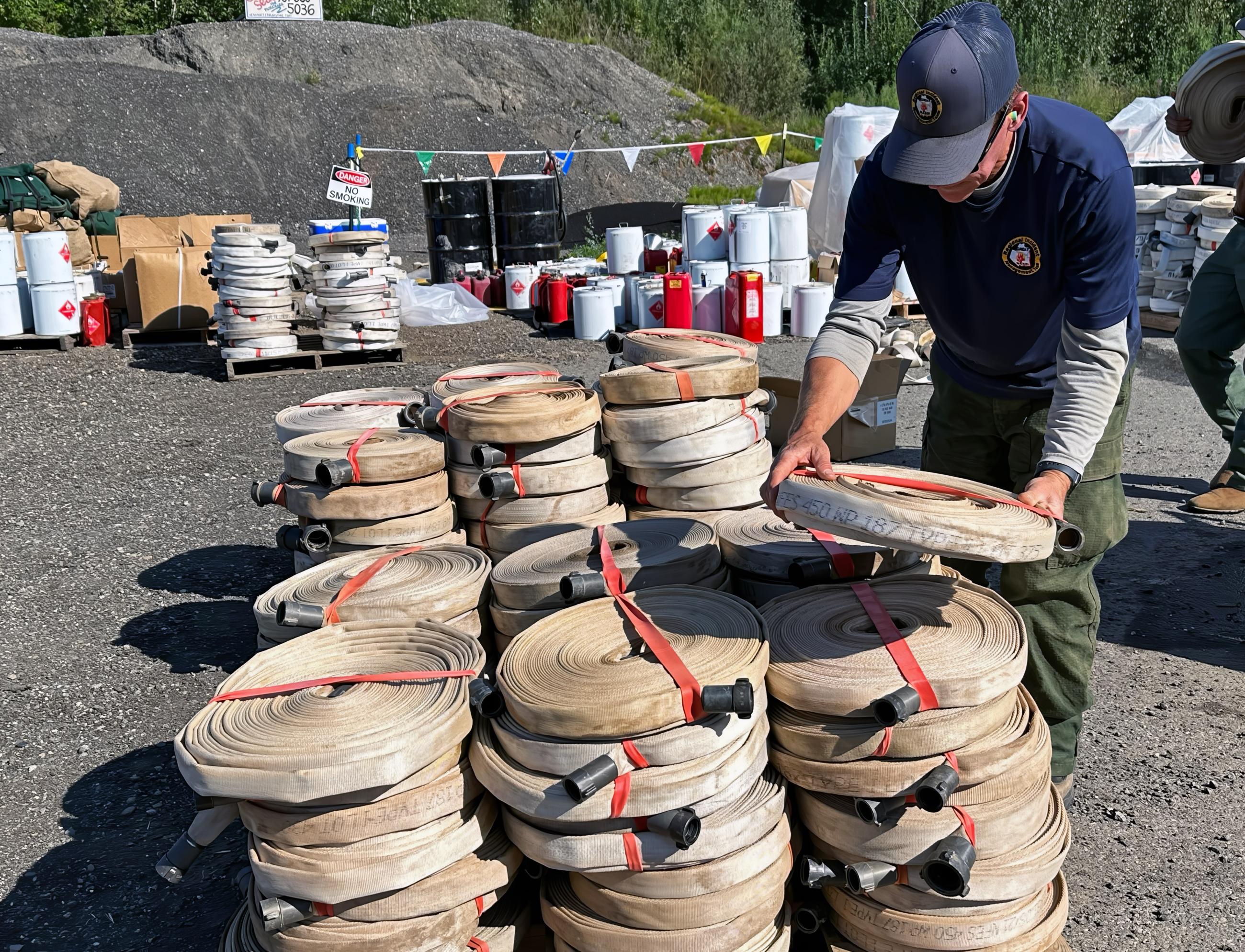 Hoses are loaded on pallets after rerolled to be shipped back to the cache for refurb