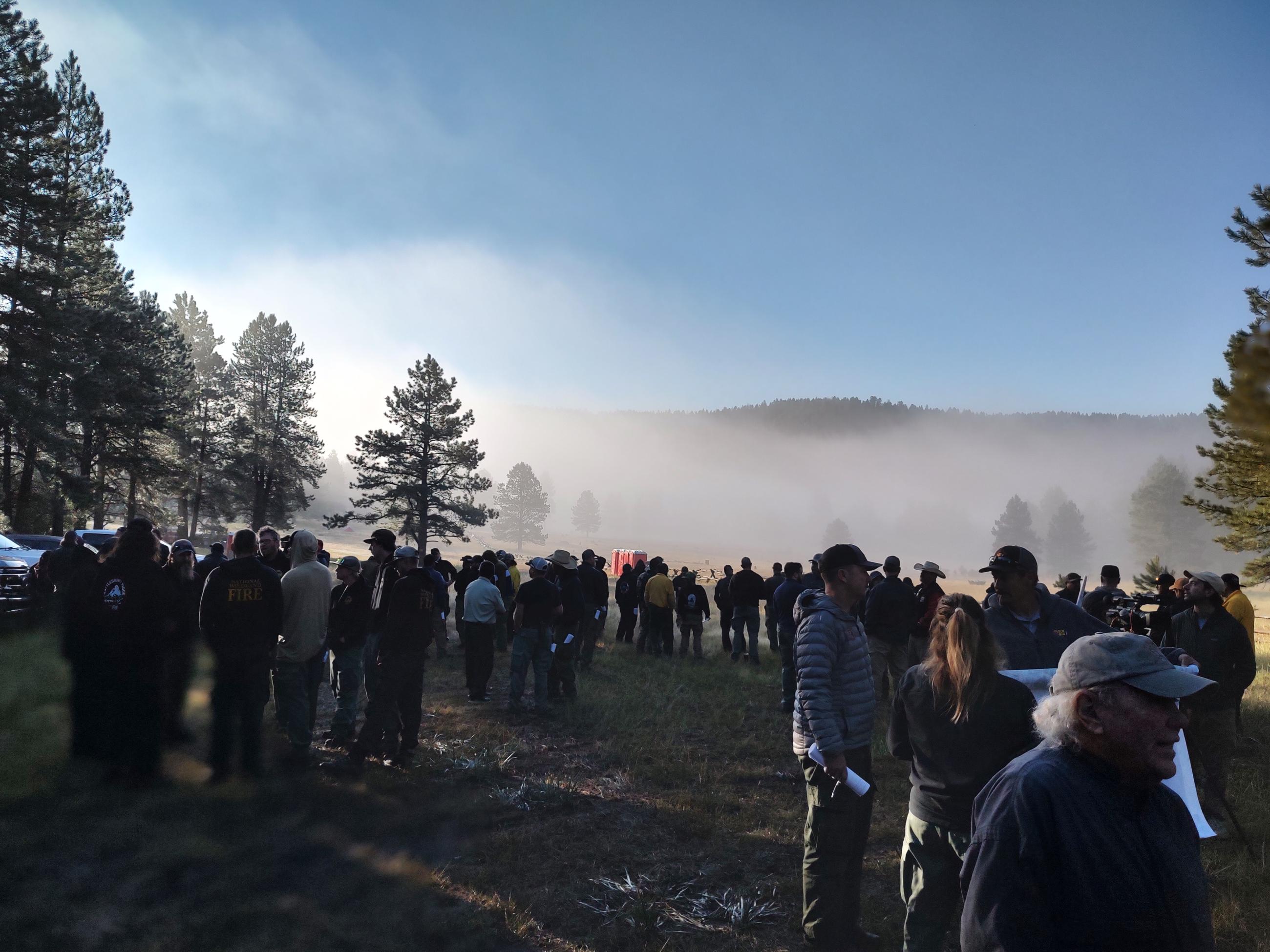Image is of a photo showing fog settling in at spike camp on the morning of Aug 9, 2023. 