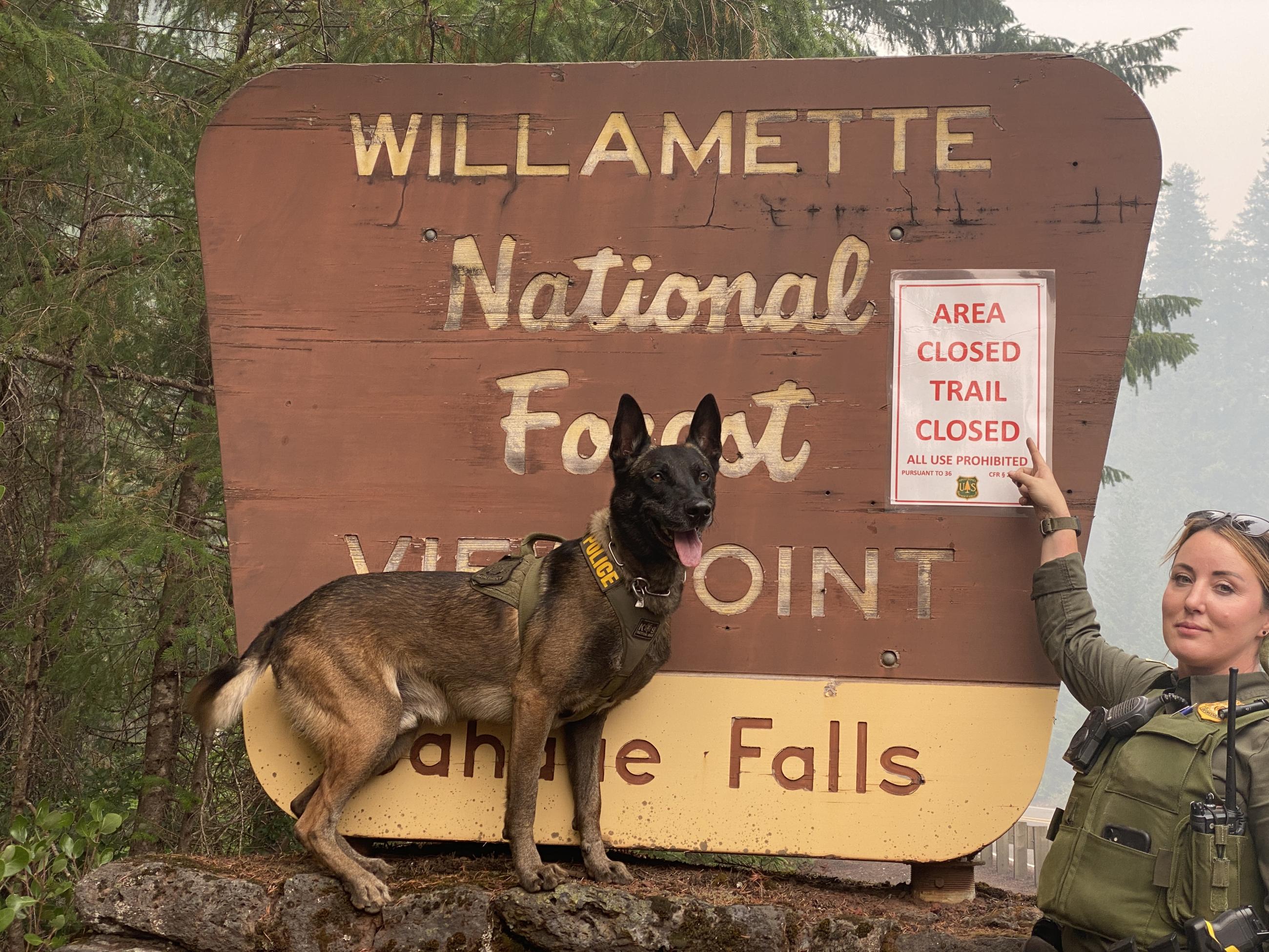 K9 Quatro and Law Enforcement Officer Felicia highlighting forest closure areas 8/20/2023 