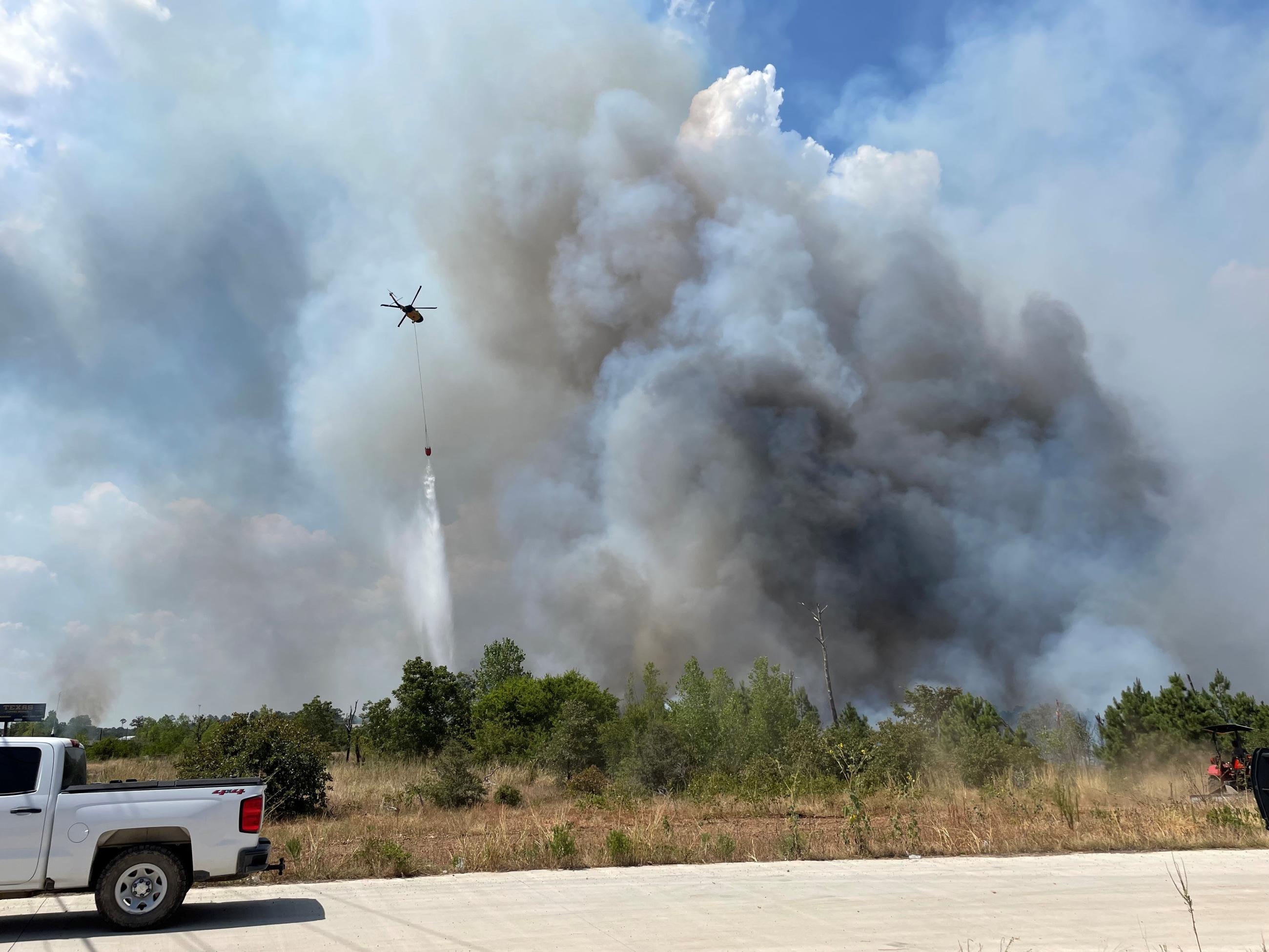 Water drop by helicopter along SH-71