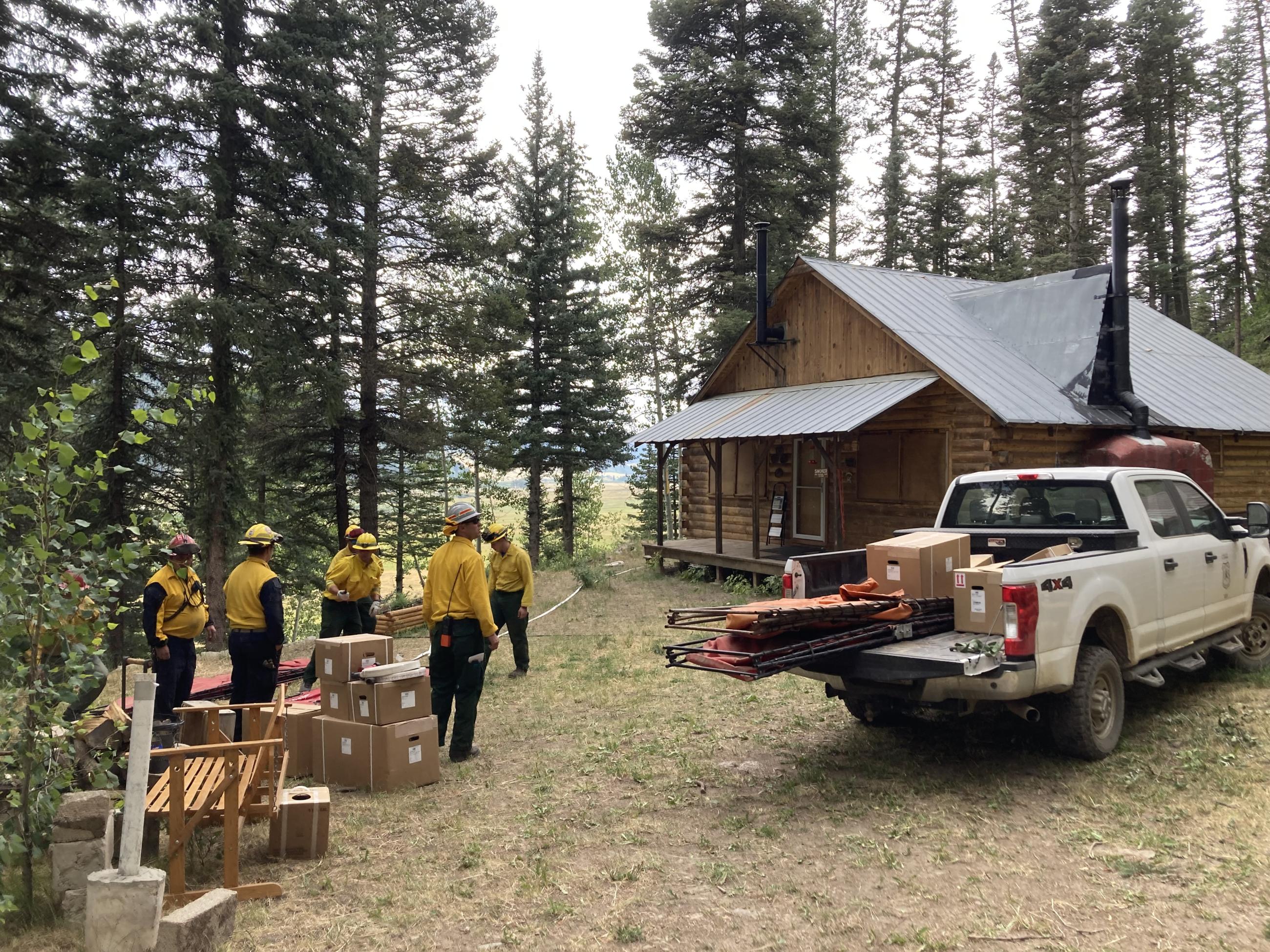 Firefighter protecting structures