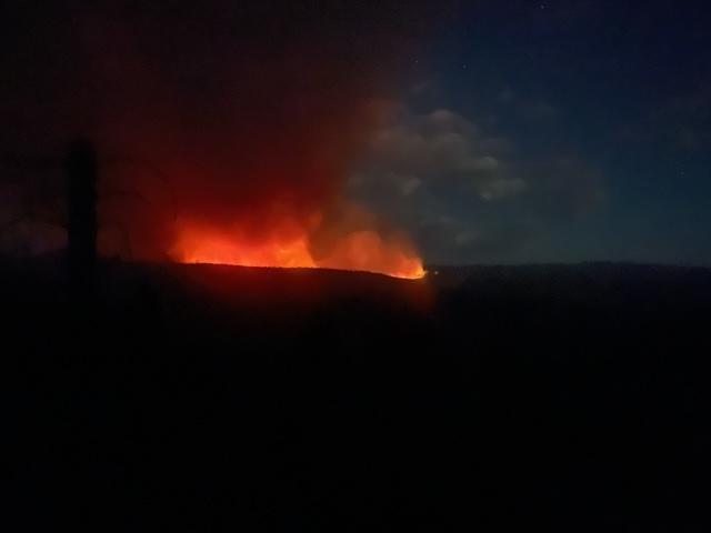 The image is of the Black Feather Fire post sunset on August 6, 2023. 