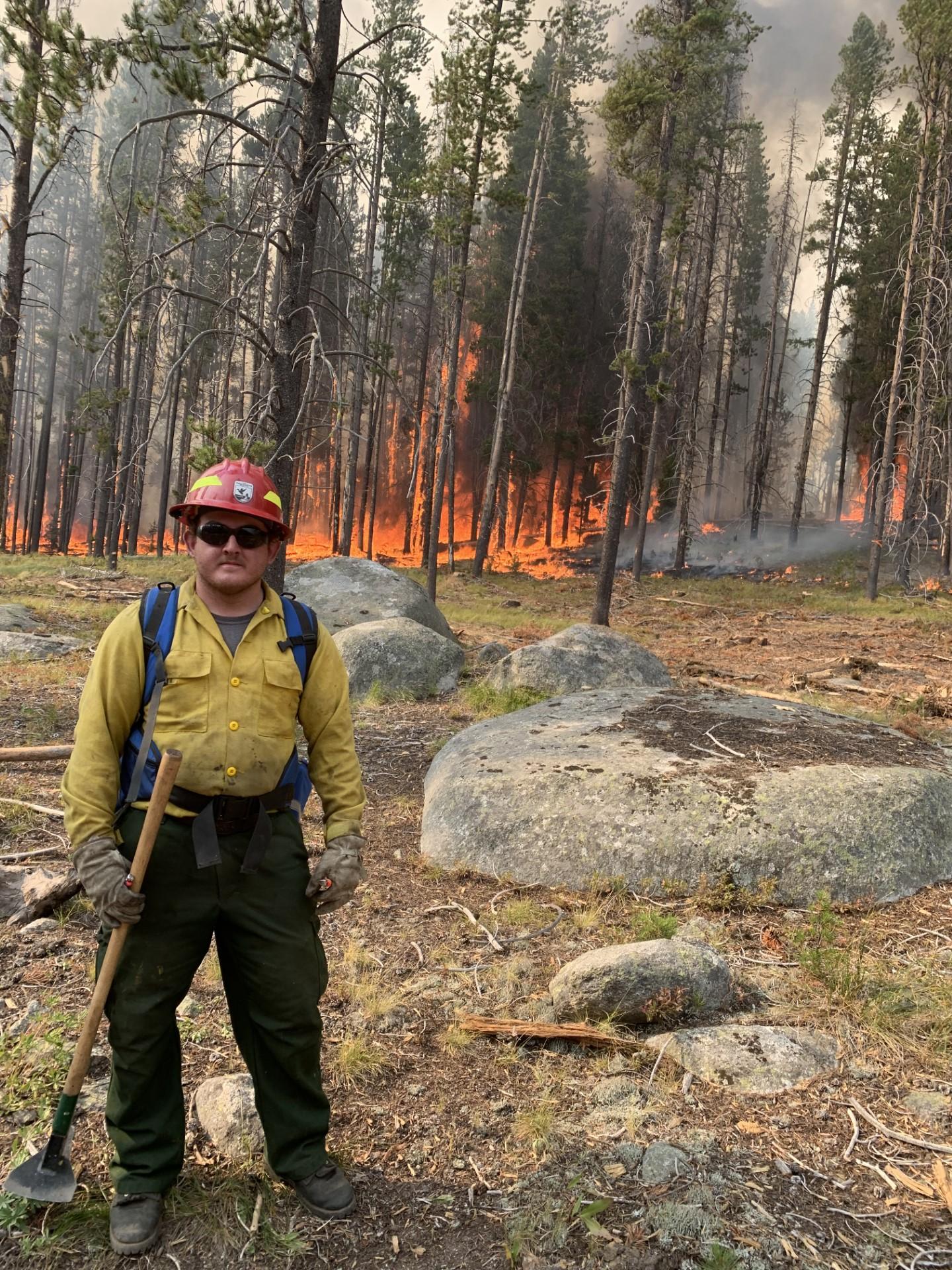 A U.S. Fish and Wildlife Service firefighter works on the Bowles Creek Fire.