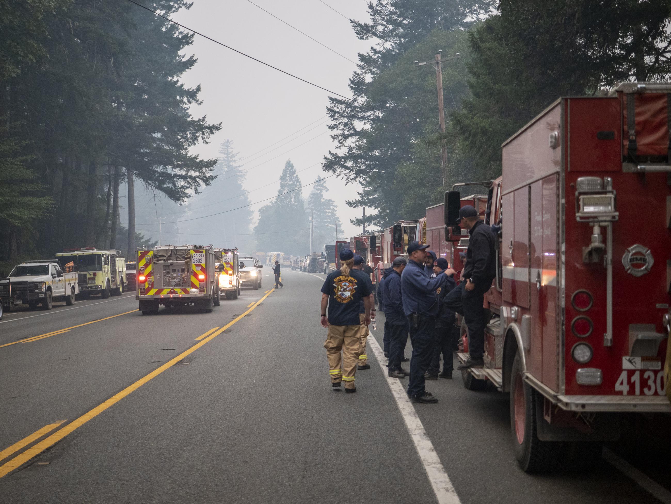 Fire engines line the roadway outside of Ward Field fire camp in Gasquet. August 24, 2023