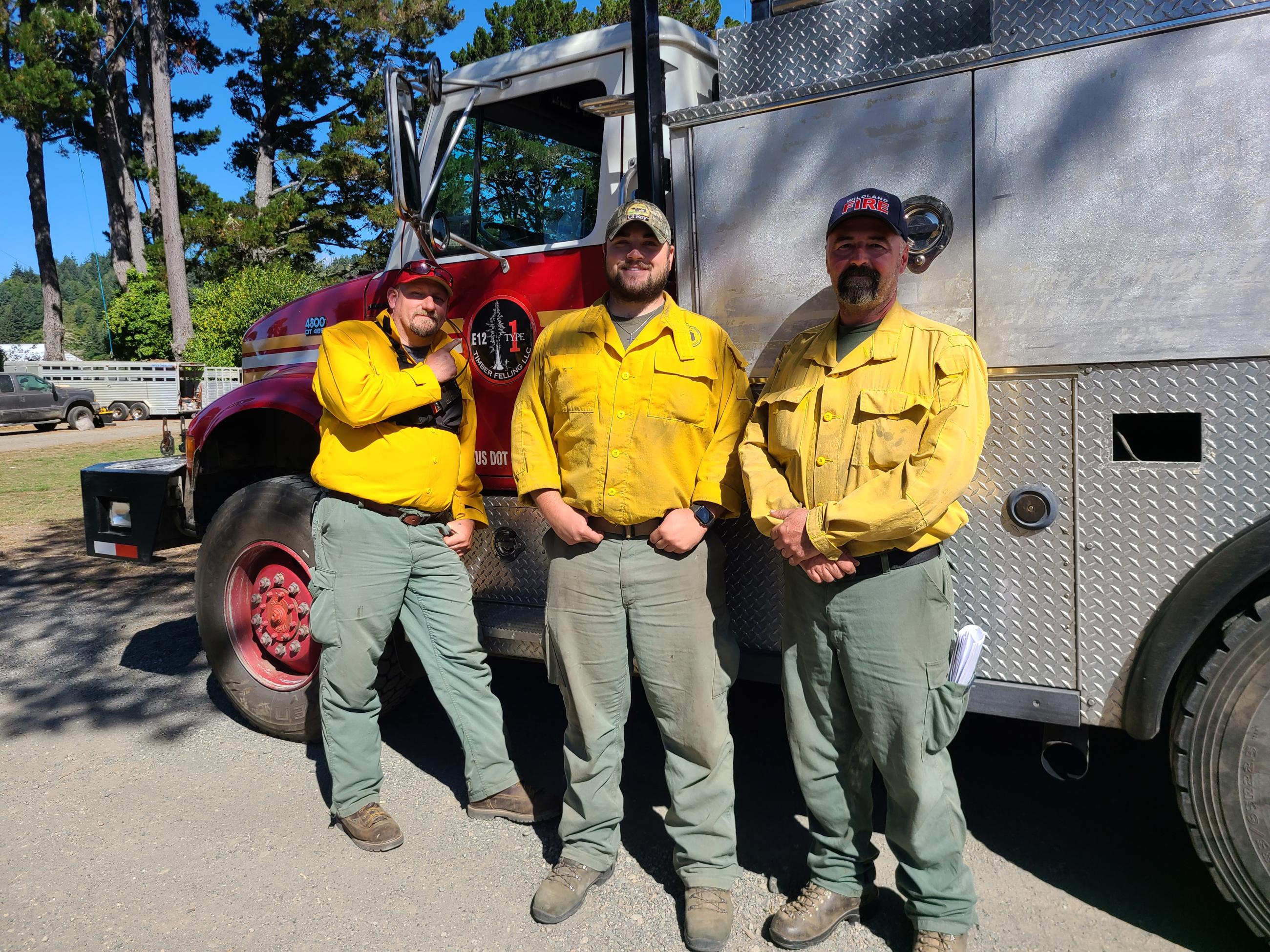The Timber Felling LLC engine crew of Ricky Howell, Zach Parker, and Steve Hughes from Grants Pass, Oregon, assigned to the Structure Protection Group serving on Elk River Road