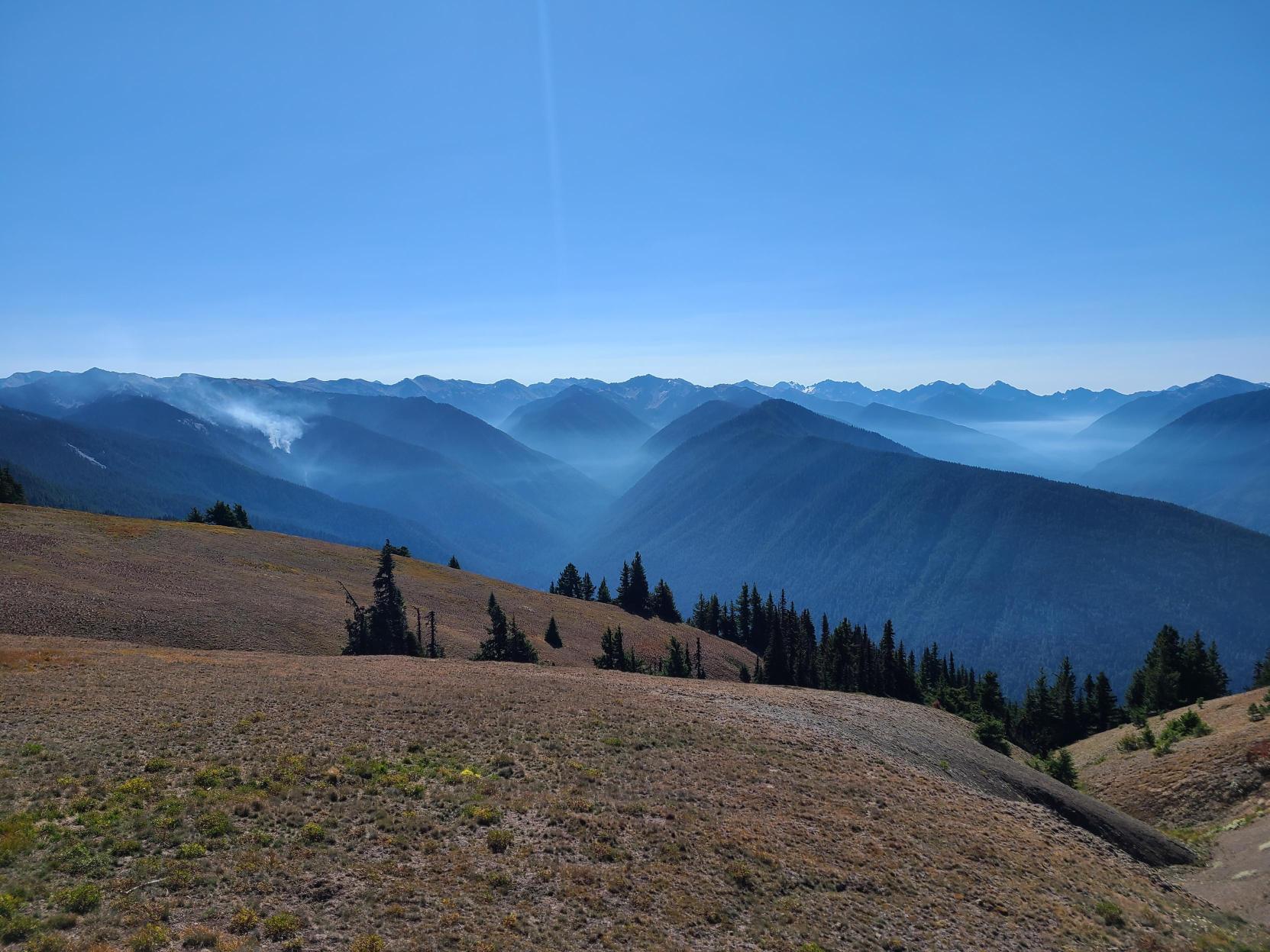 Smoke from the Eagle Point Fire settles in the valleys on September 9, 2023