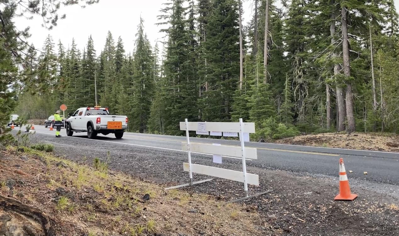 Petes Lake Fire - Flagger on Cascade Lakes Hwy 