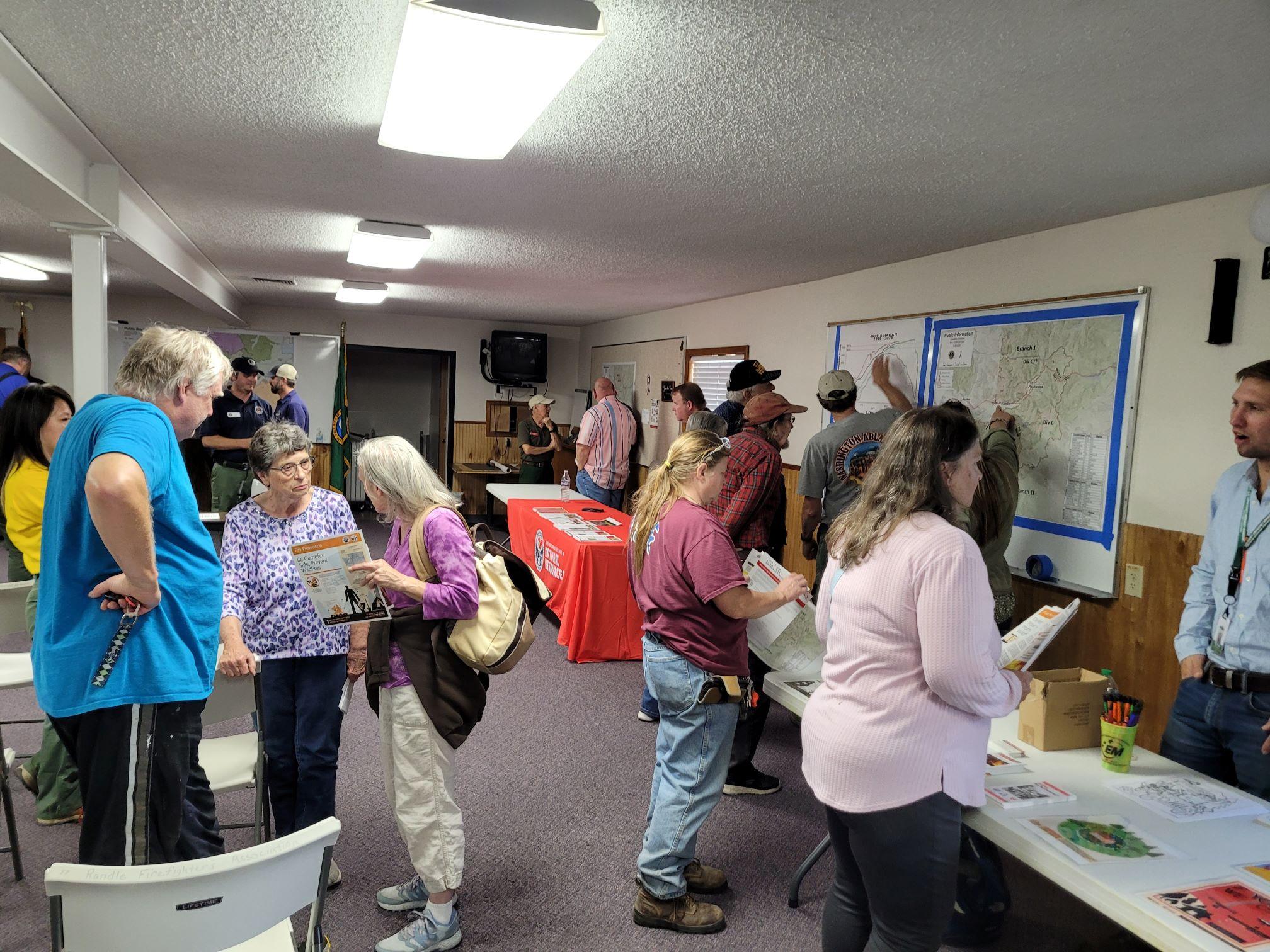 Tables and maps are setup for the public to come ask questions on the Cowlitz Complex