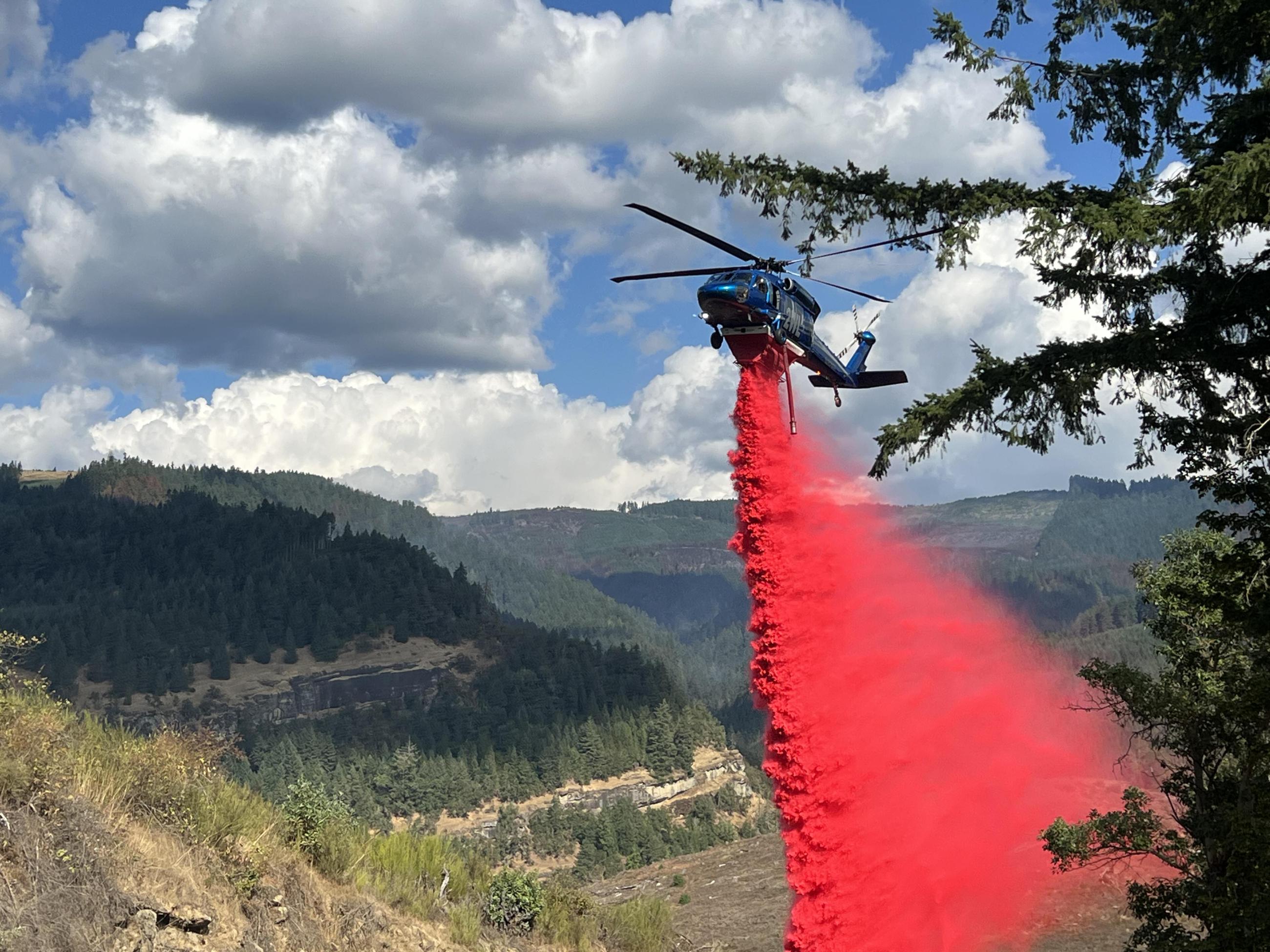 Helicopter retardant drop on Cougar Creek Fire-Prep for Tactical Operations