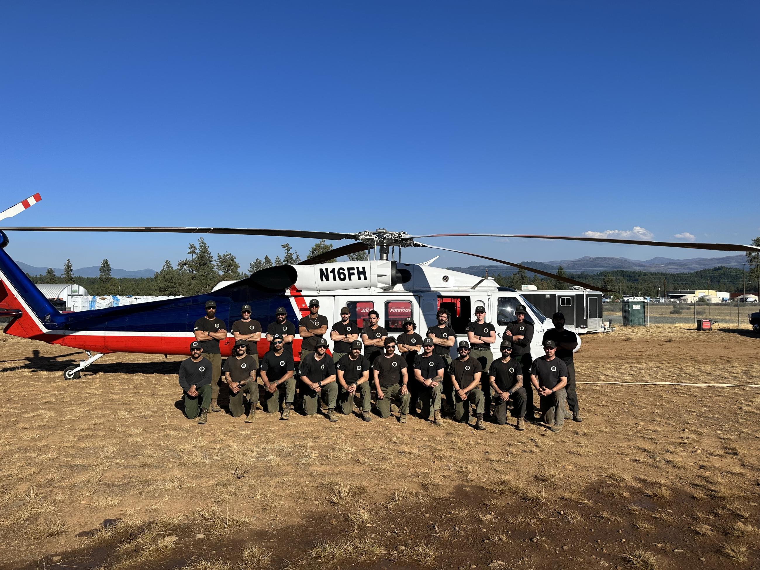 The Mad River Hotshots with a helicopter.