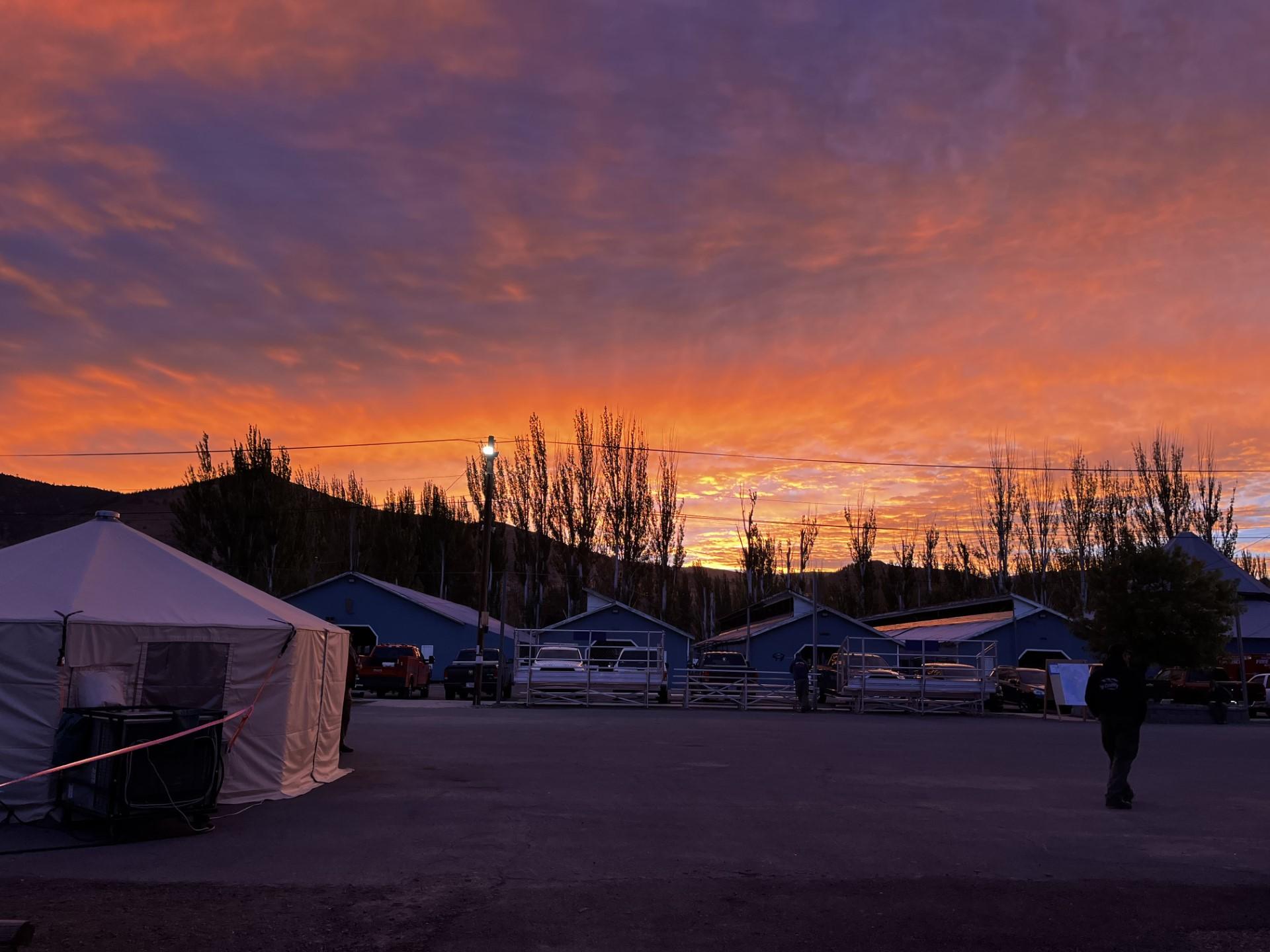 A photo of the sunrise at fire camp. 