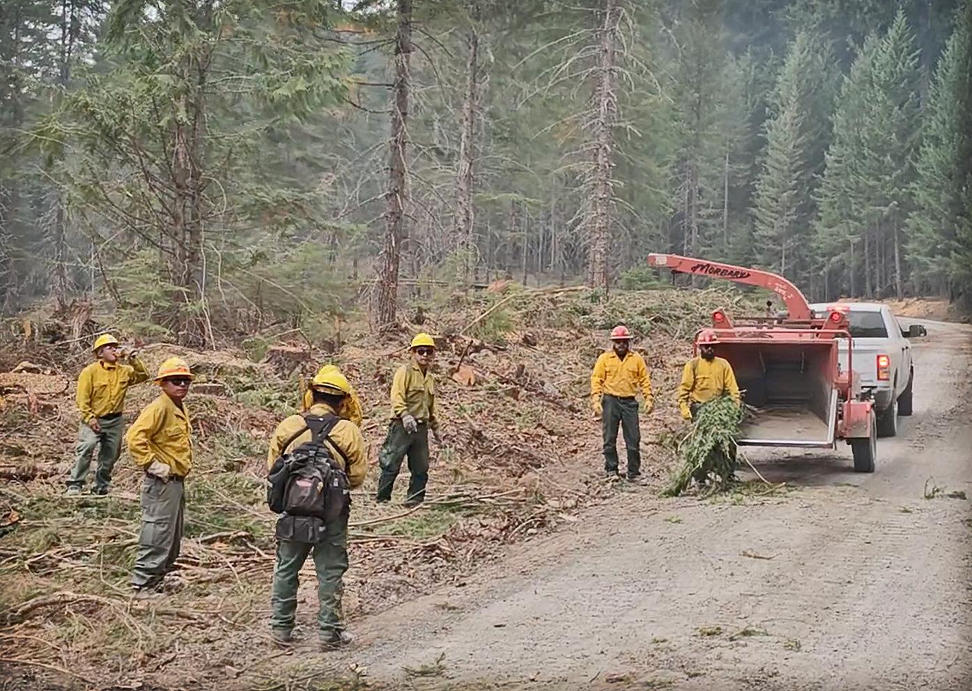 Fire crews working with chipper on the Lookout