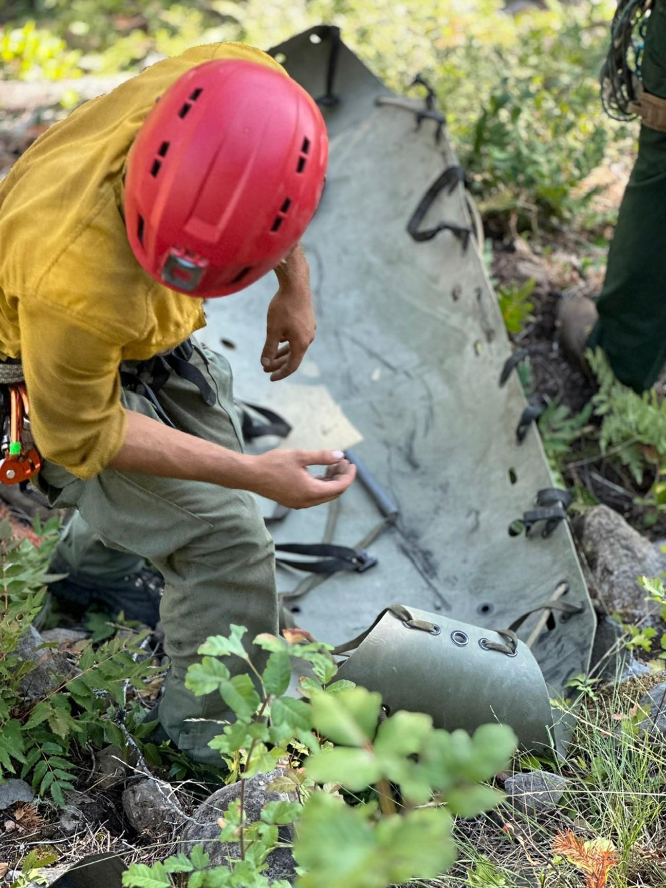 This is an image from above of a REMS Team Member working with rescue rope