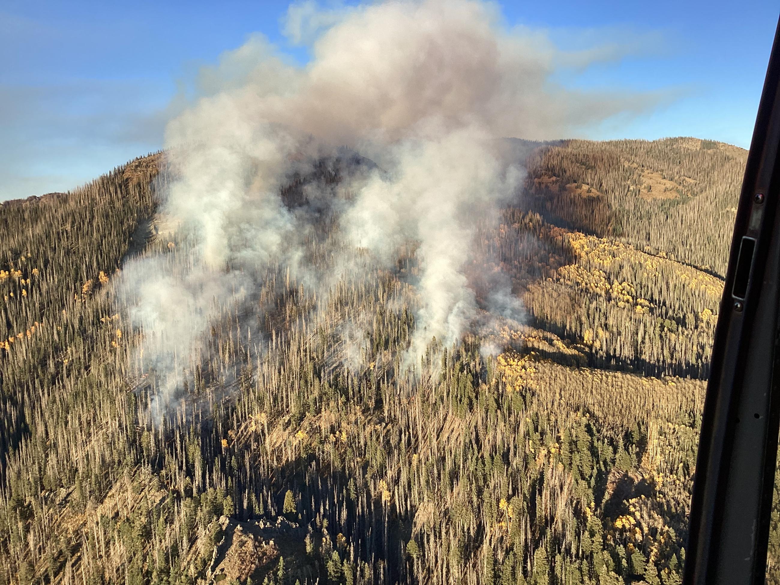 Photo taken from a helicopter showing the fire burning up in mountains northeast of Pagosa Springs, CO