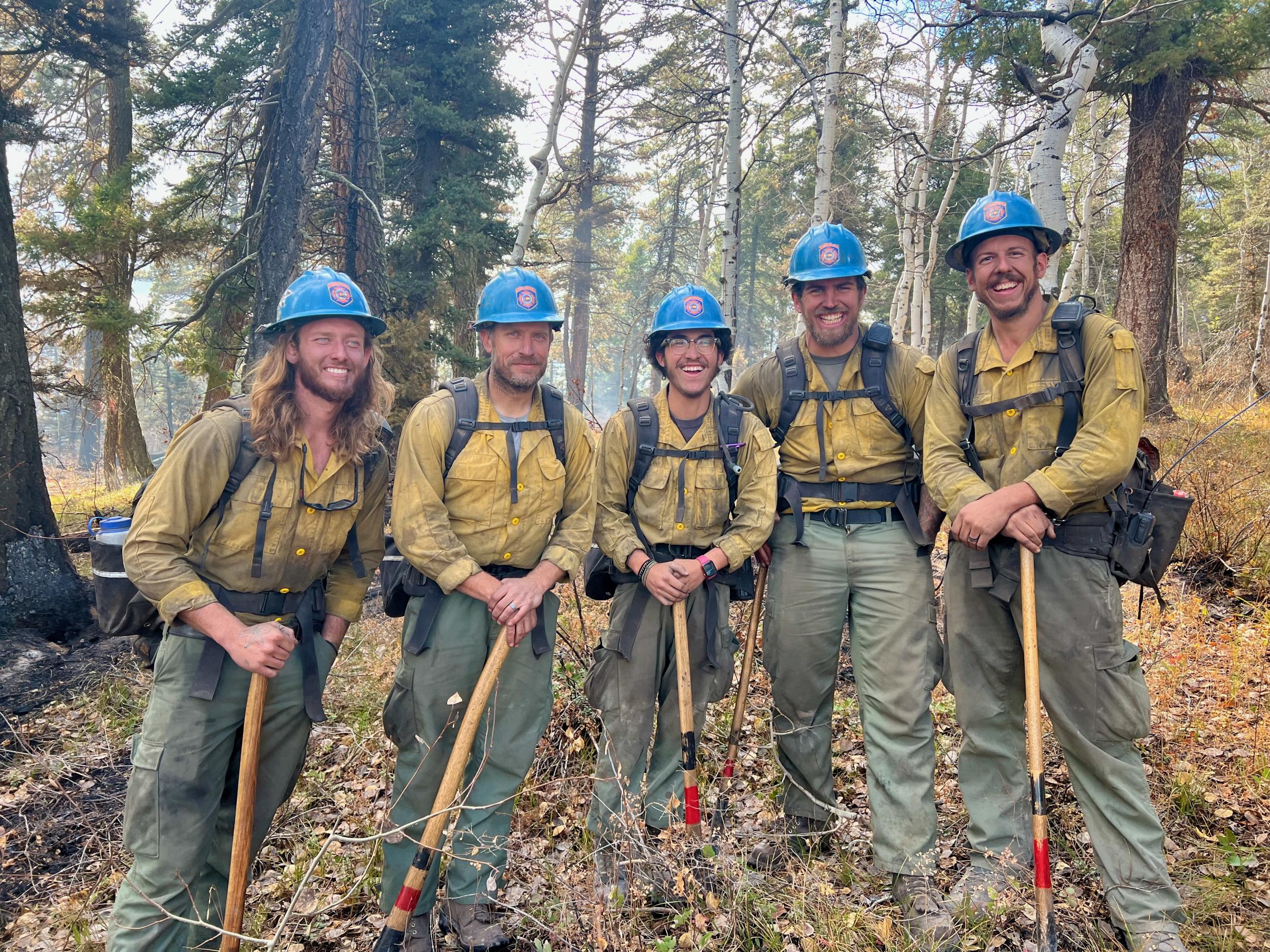 Members of the Colorado Division of Fire Prevention and Control Grizzly Peak Fire Module on the Trail Springs Fire October 29, 2003.