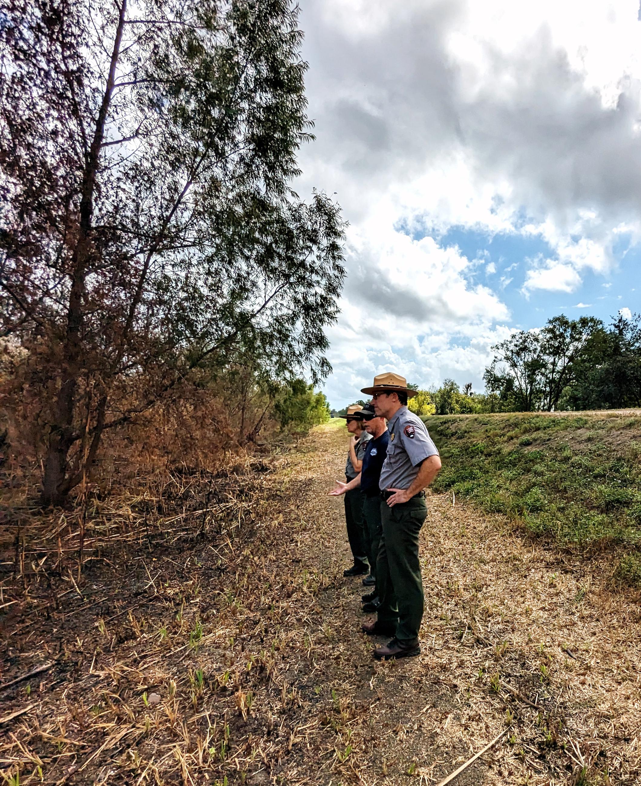 NPS officials survey land with Incident Commander