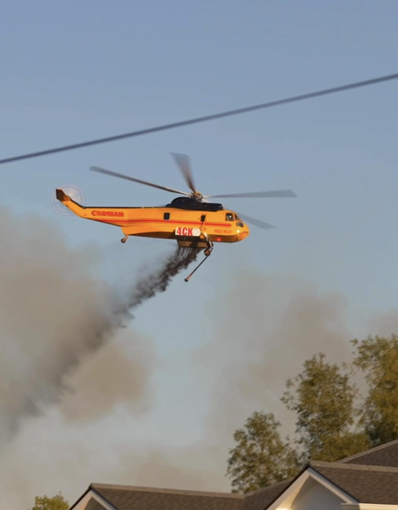 Helicopter drops water