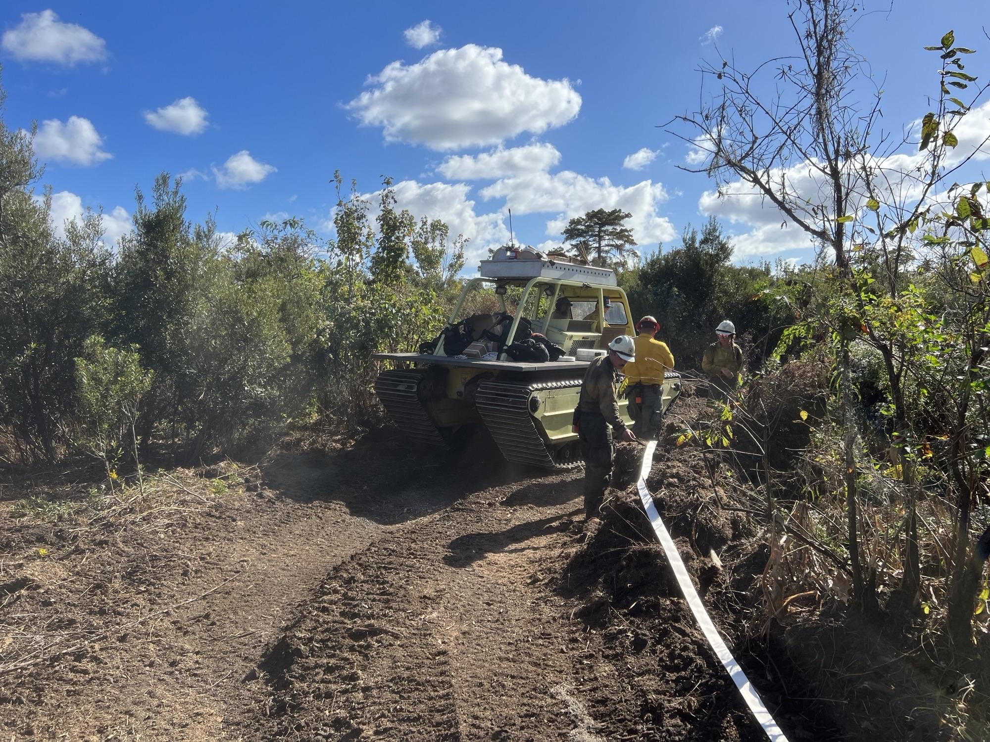 This is an image of Marsh Master navigating the fire ground