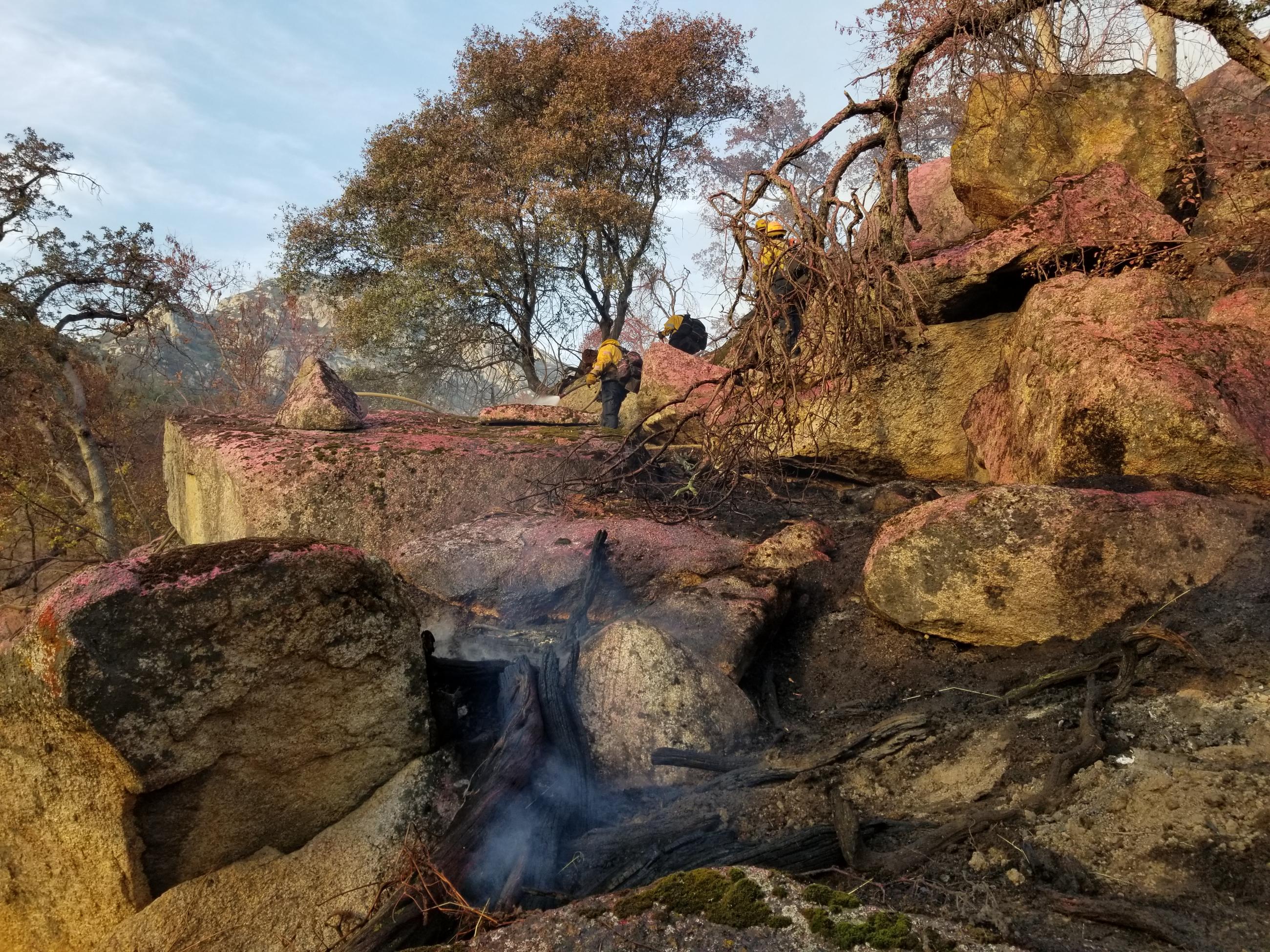 Firefighters mopping up on the Sycamore Fire