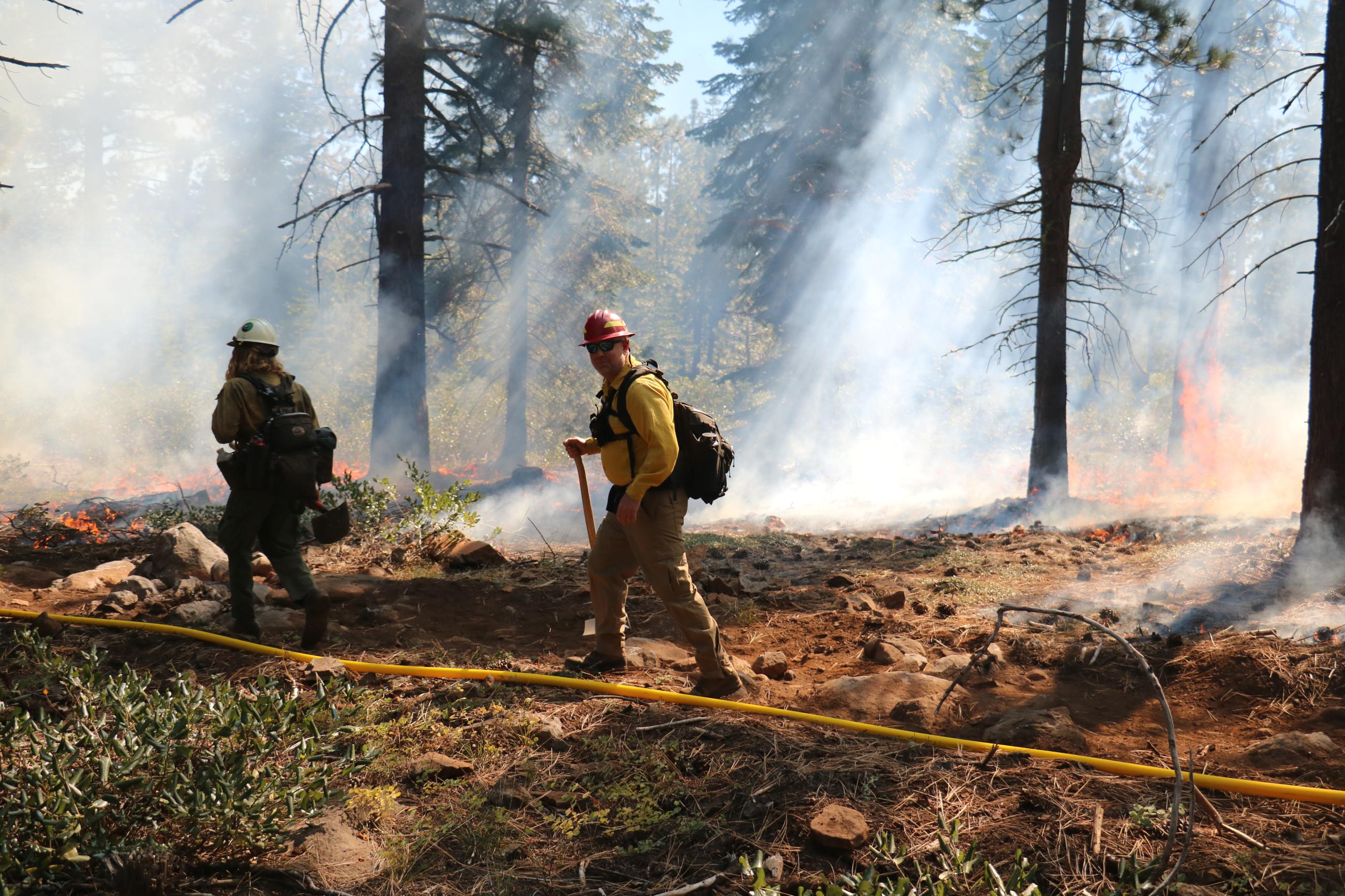 Two firefighters monitoring Sagehen Hills Underburn