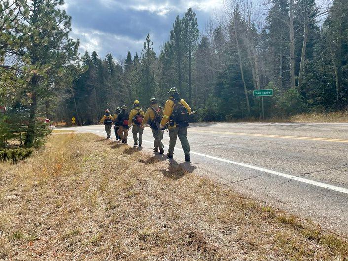  As firefighters return from the fireline, they continue to prepare equipment and supplies for the freezing temperatures ahead, with some items being moved indoors overnight.