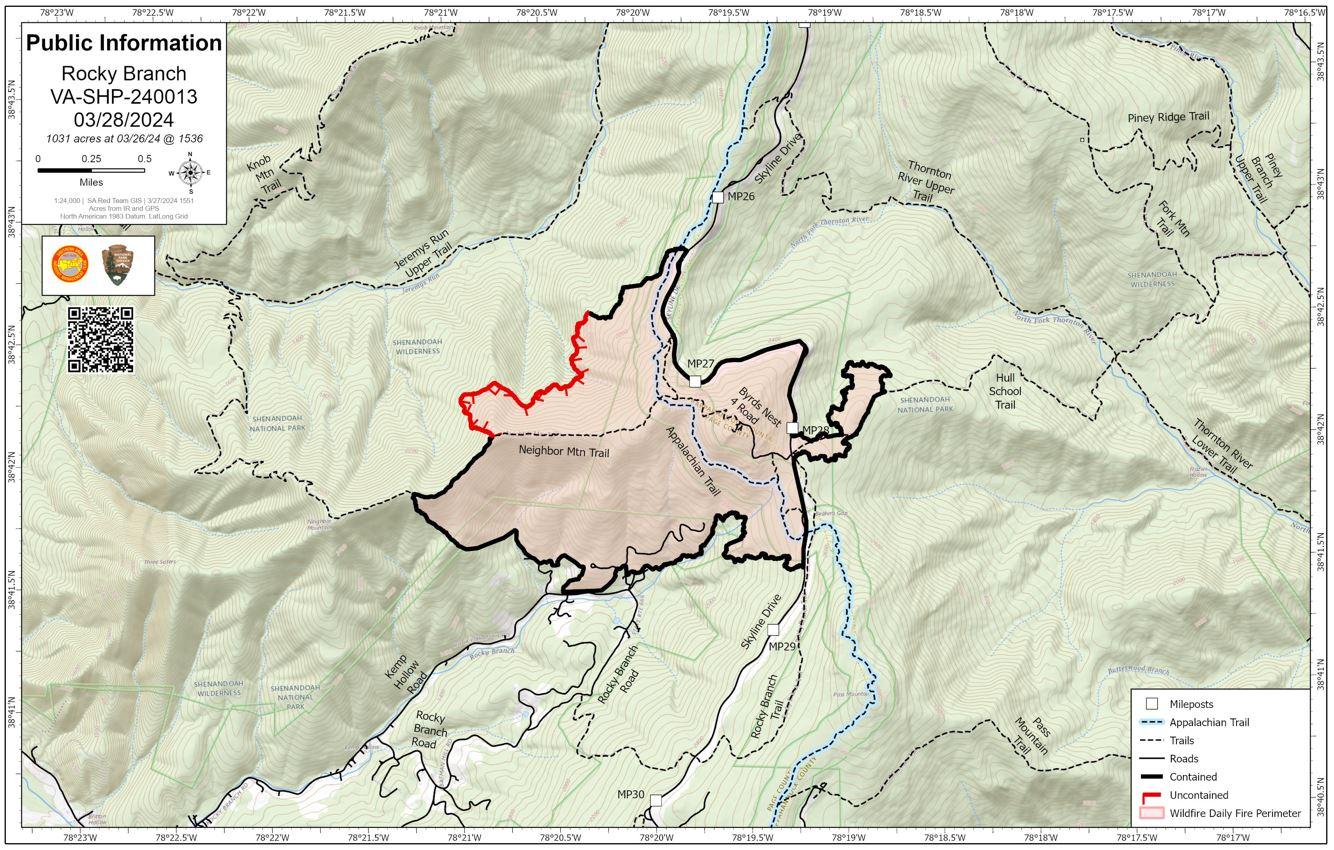 Green topographical map showing red and black lines to indicate fire footprint.
