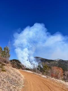 Light white smoke on a dirt road 