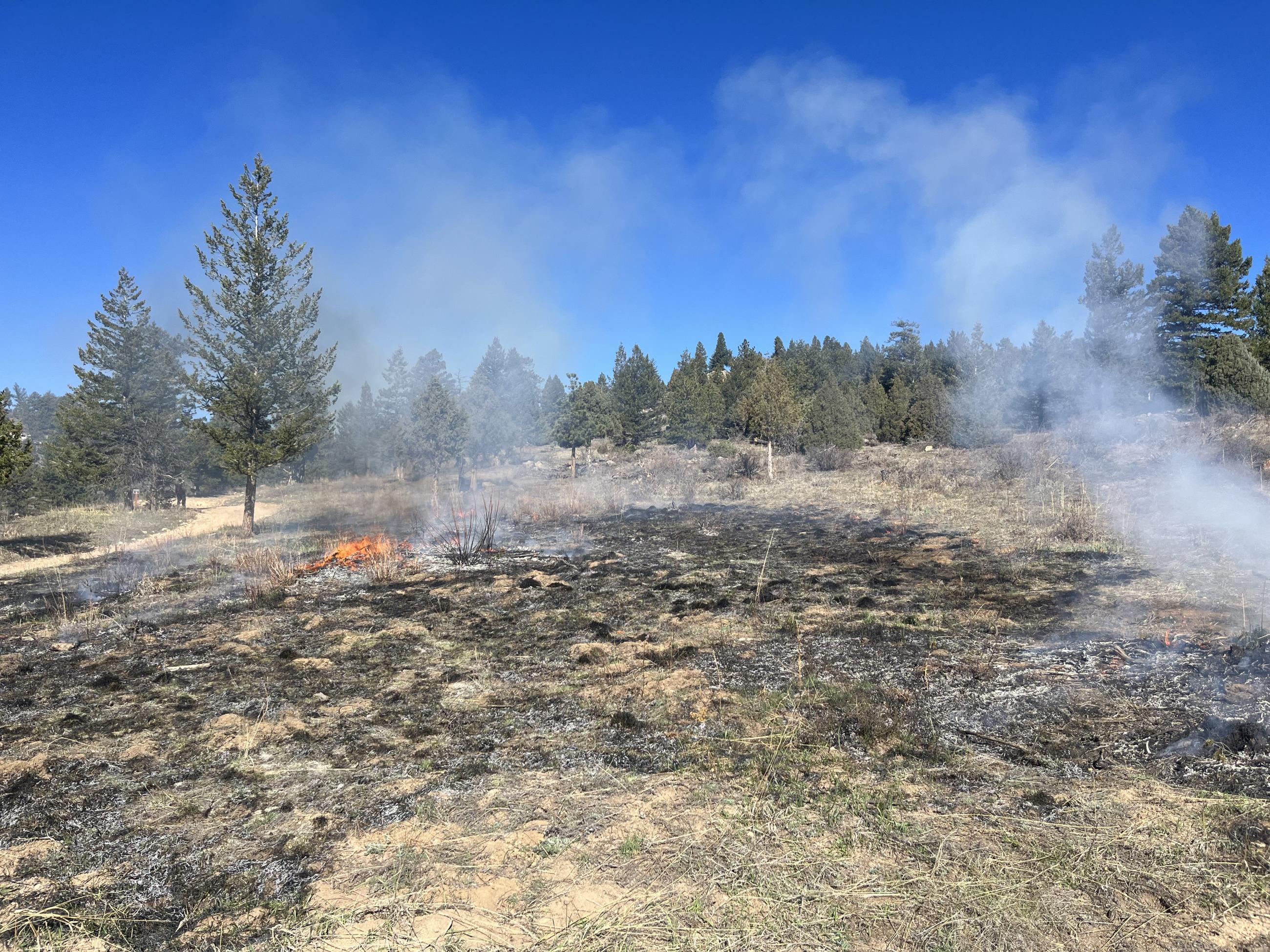 A small test fire nears completion on a hill for the Forsythe II prescribed burn. 