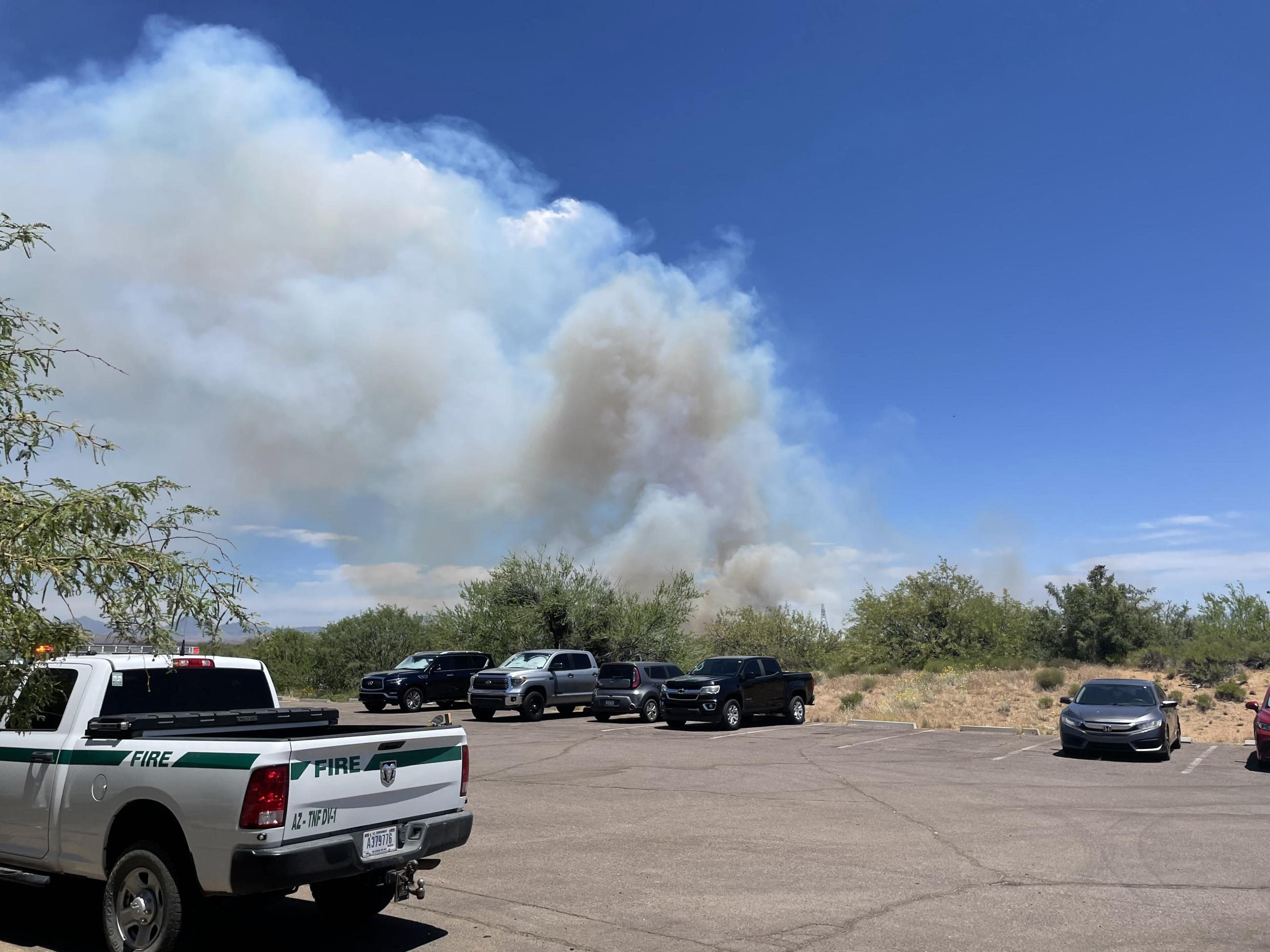Fire activity as seen from the Cave Creek Ranger District office, Saturday, May 18, 2024