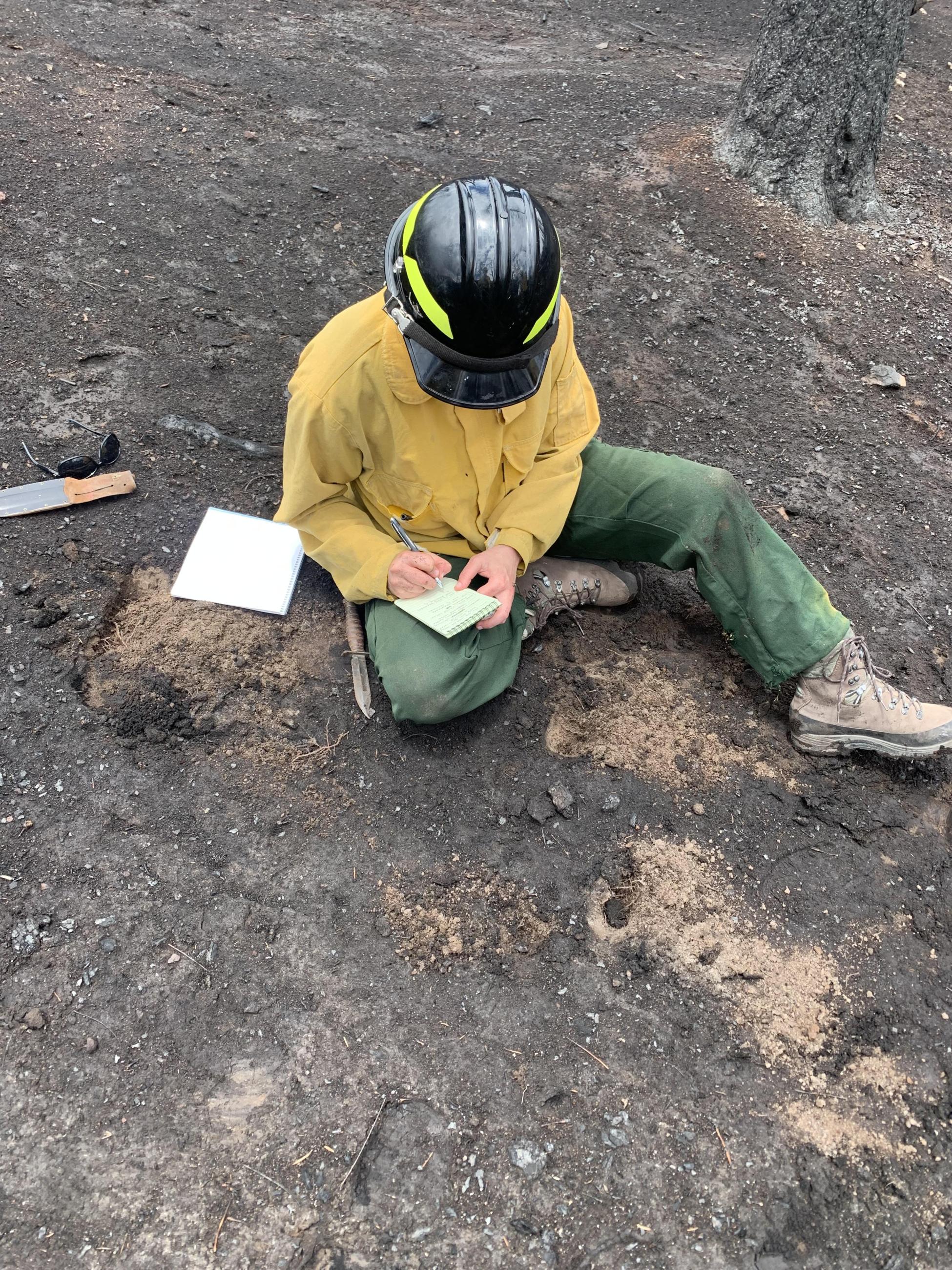 BAER Soil Scientist recording field notes for soil burn severity in the South Fork burned area