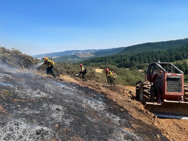 Firefighters Work in the Black