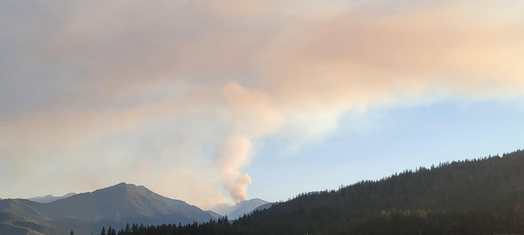 Picture of mountain with a large amount of smoke