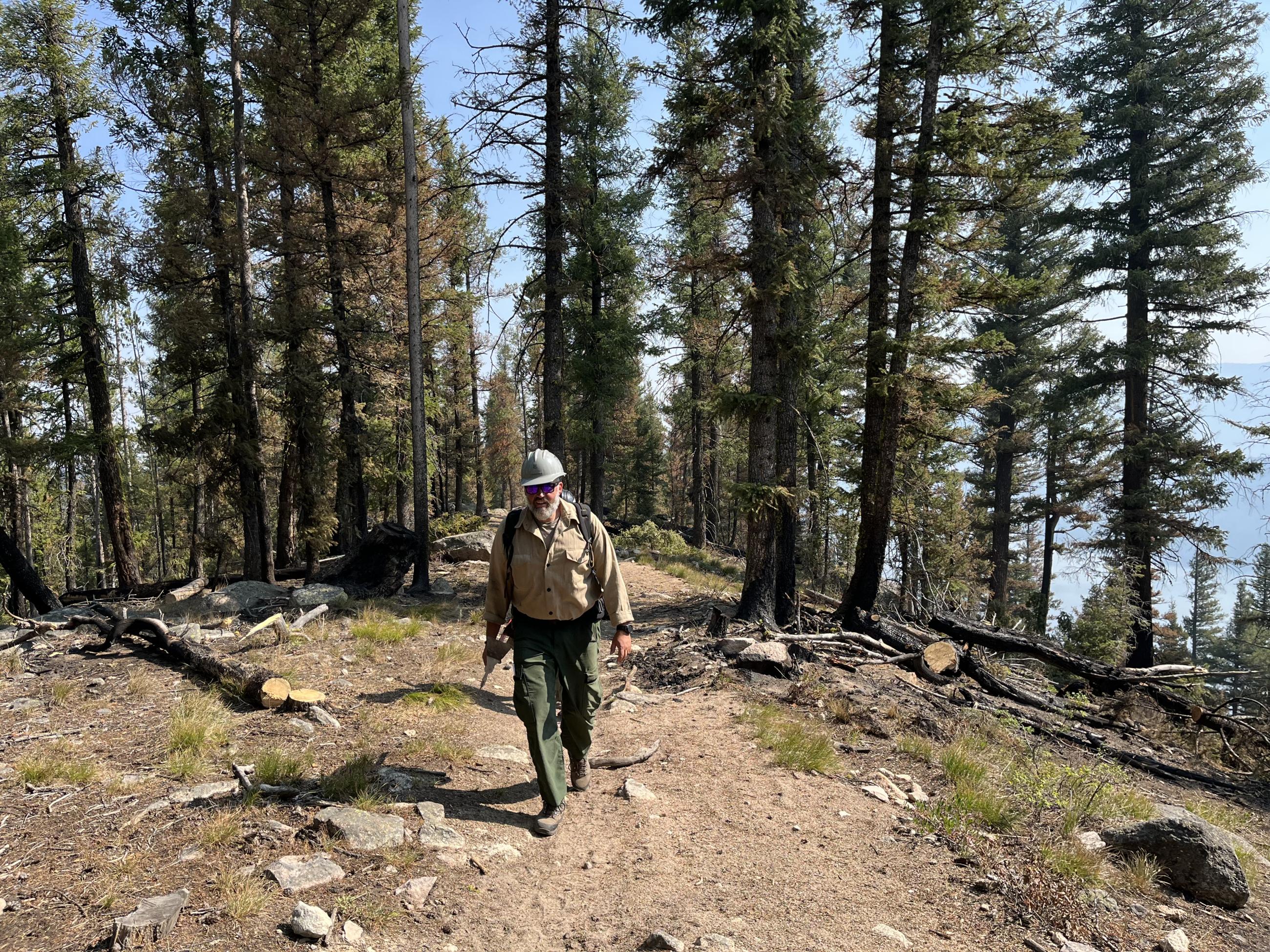 Safety officer patrols the line on the 101 Trail, July 25, 2024