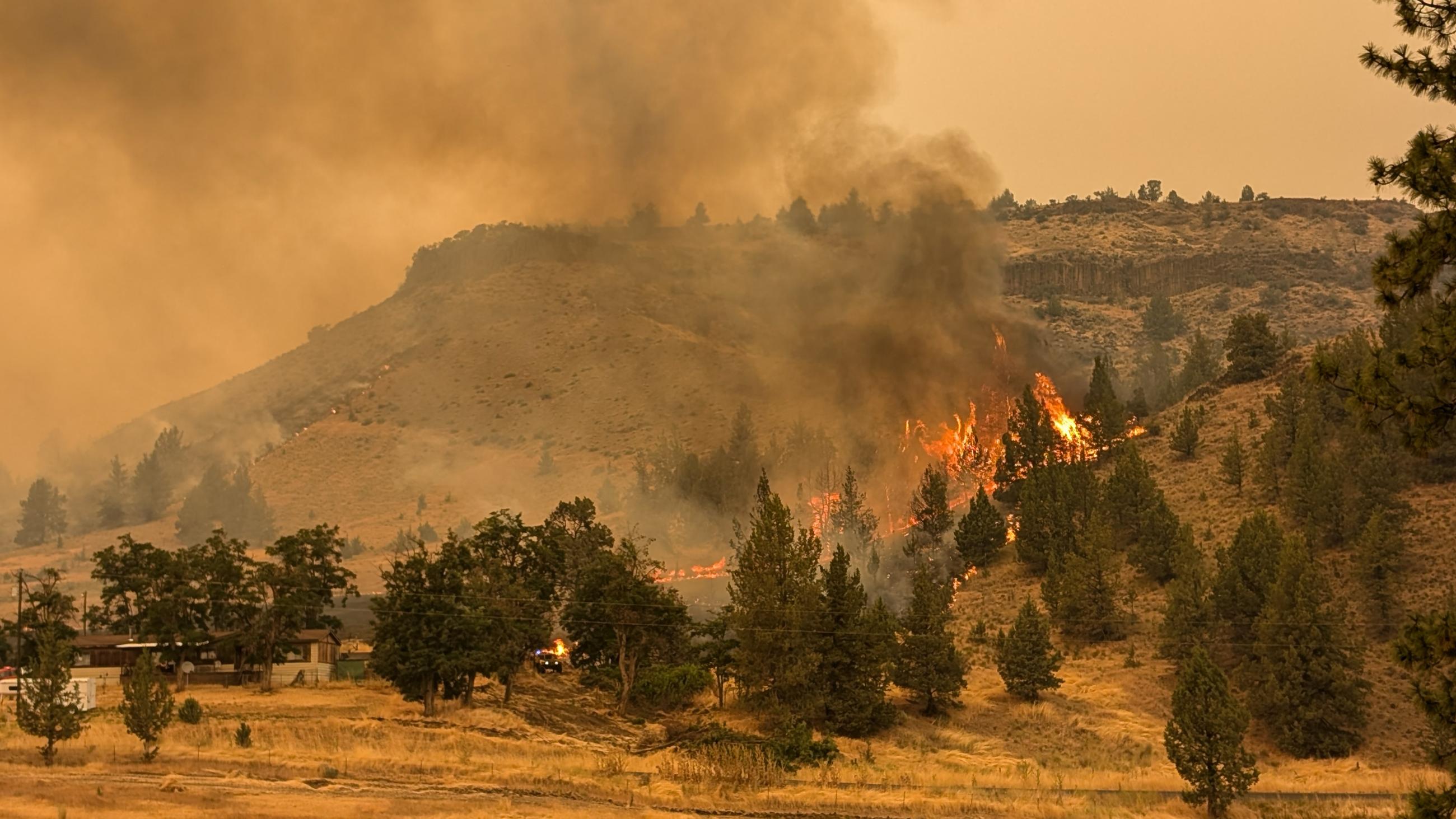 The Lone Rock Fire burns near values at risk. 