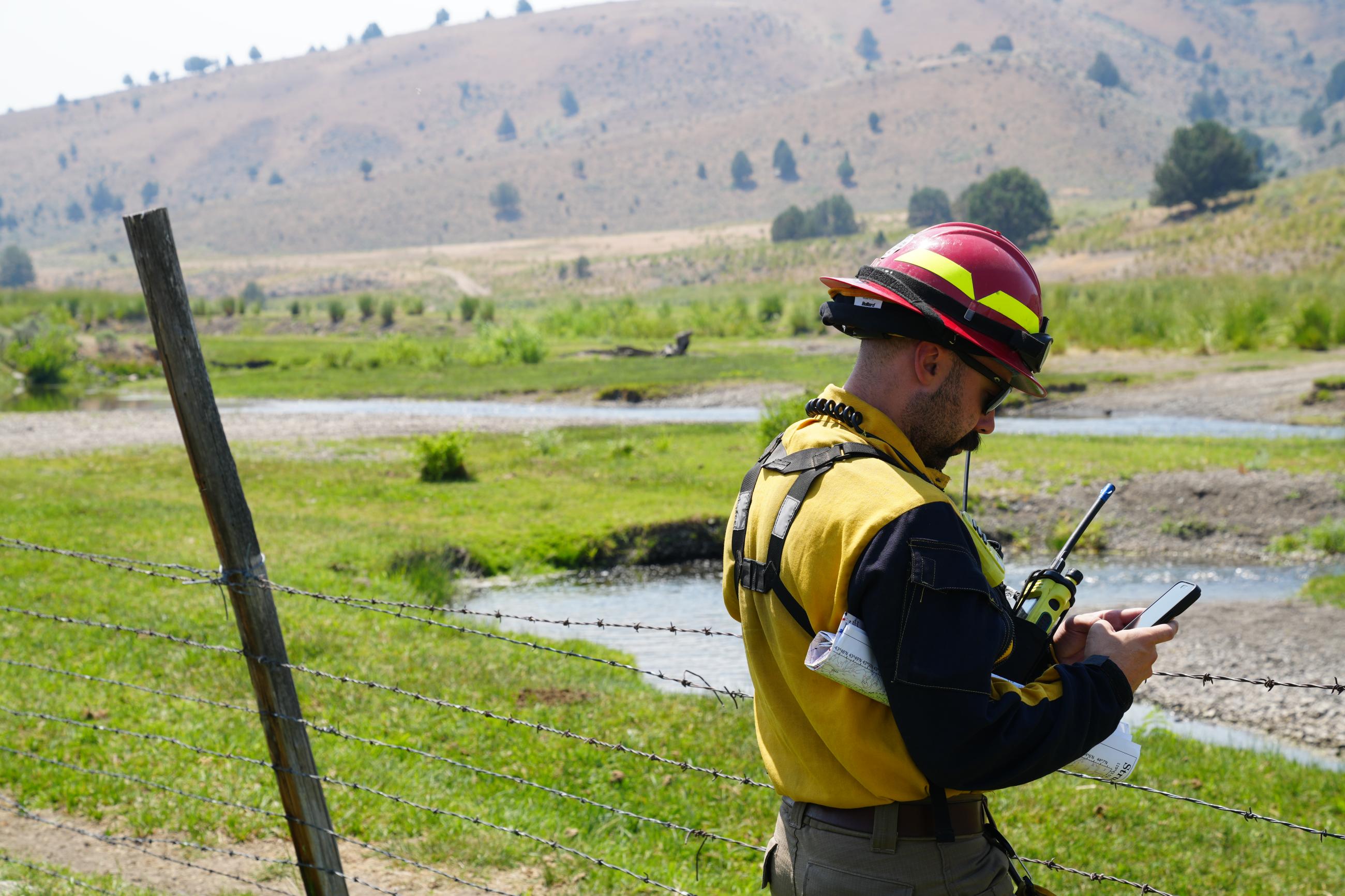 Structural firefighter prepares to survey a property 