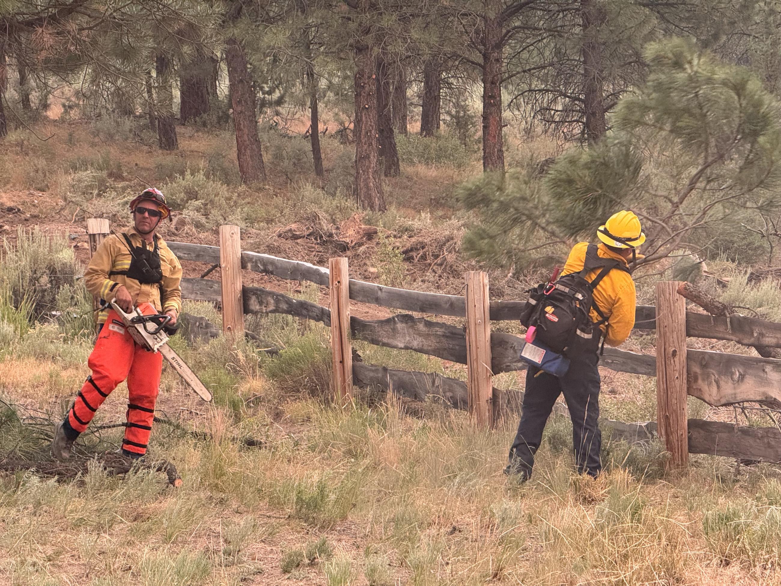 Structure firefighters protect a yurt on the Falls Fire. 2024.