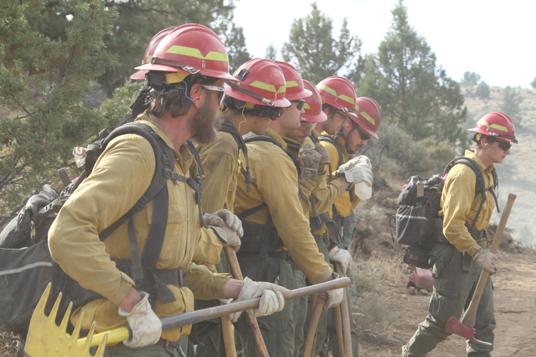 Hand Crew with tools Prepares to Engage Fire, Div O, July 17.