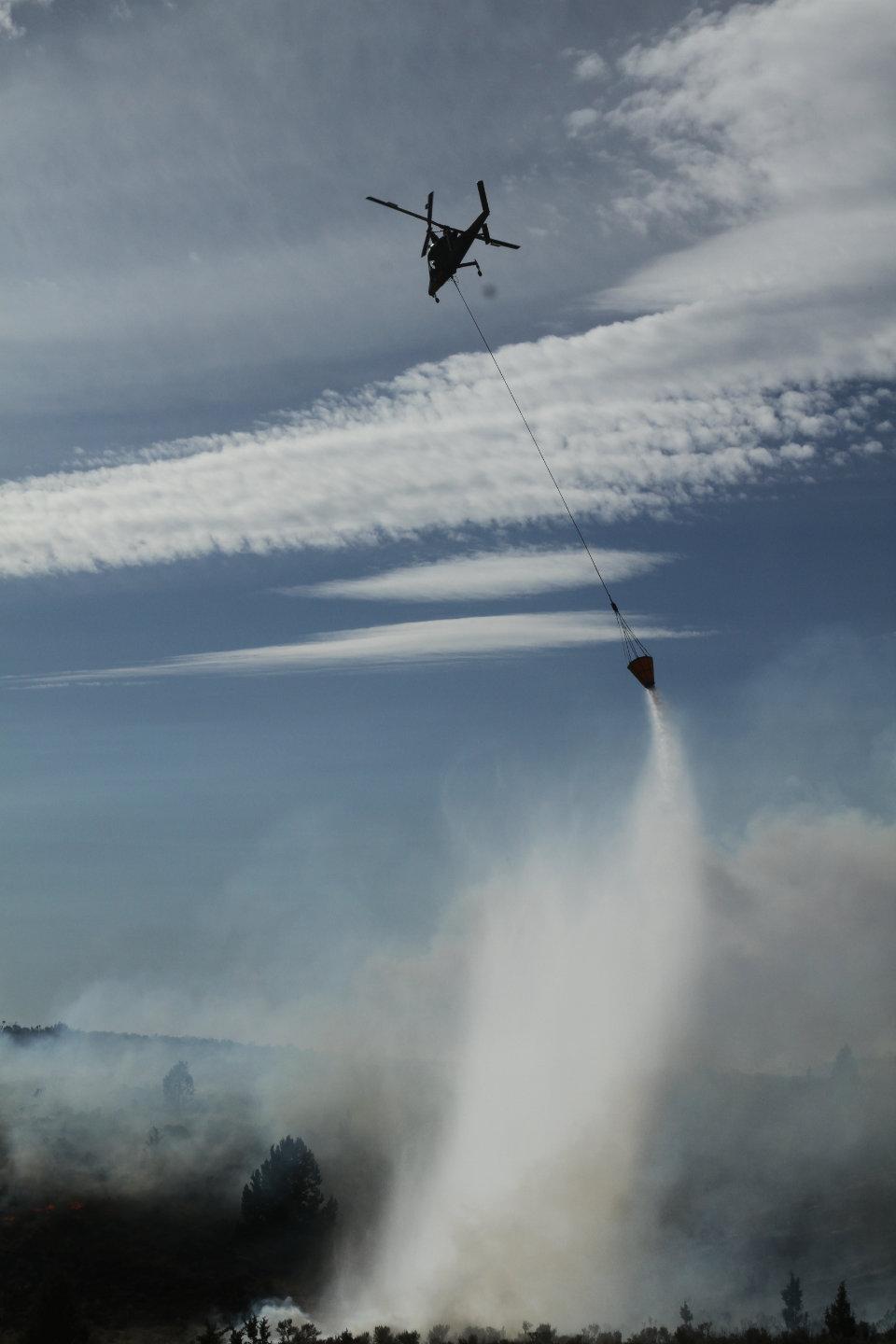 KMAX Helicopter Drops Bucket of Water on Div O. July 17.