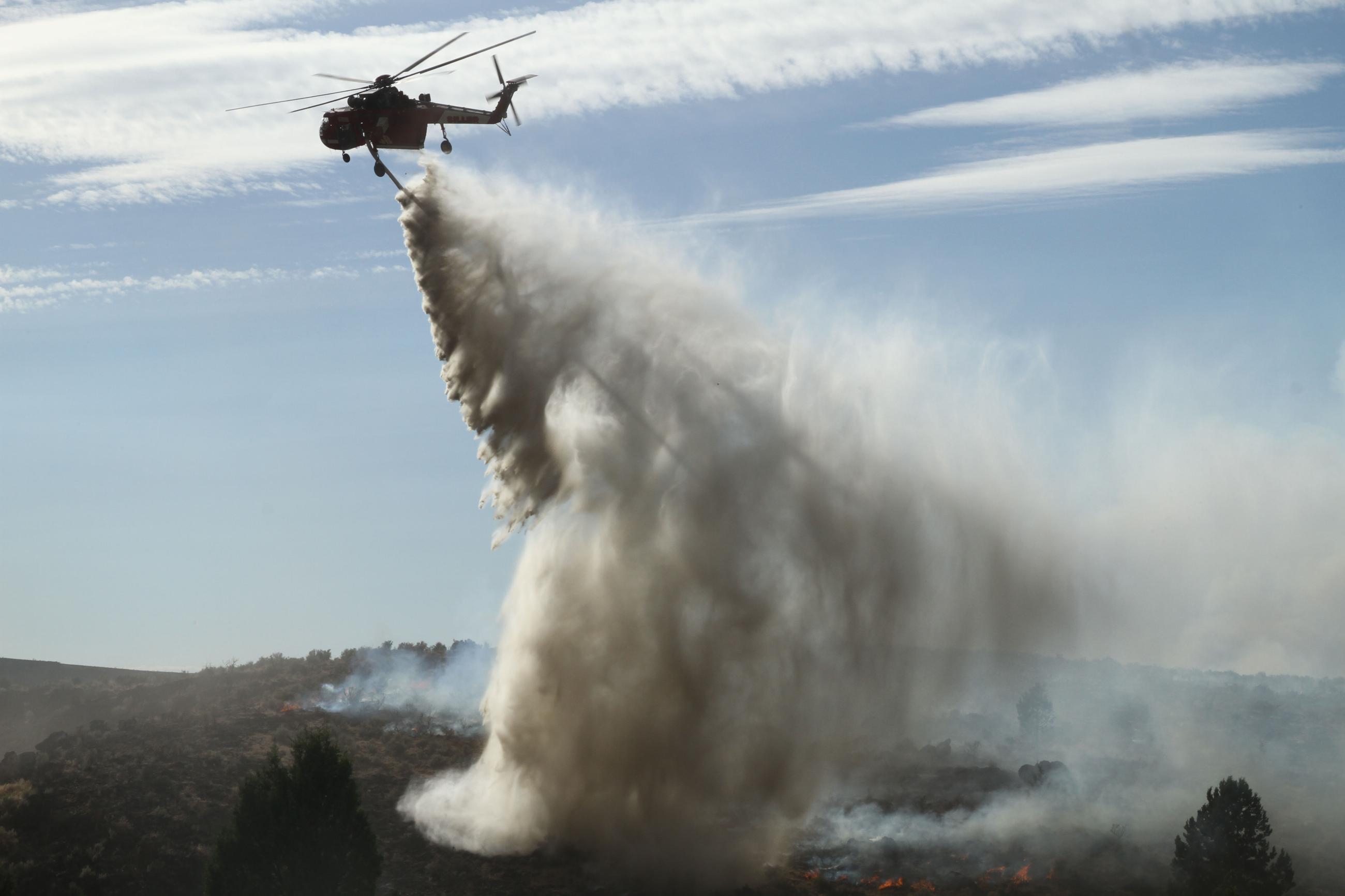 Sky Crane Helicopter Drops Water From Belly Tank, Div O, July 17.