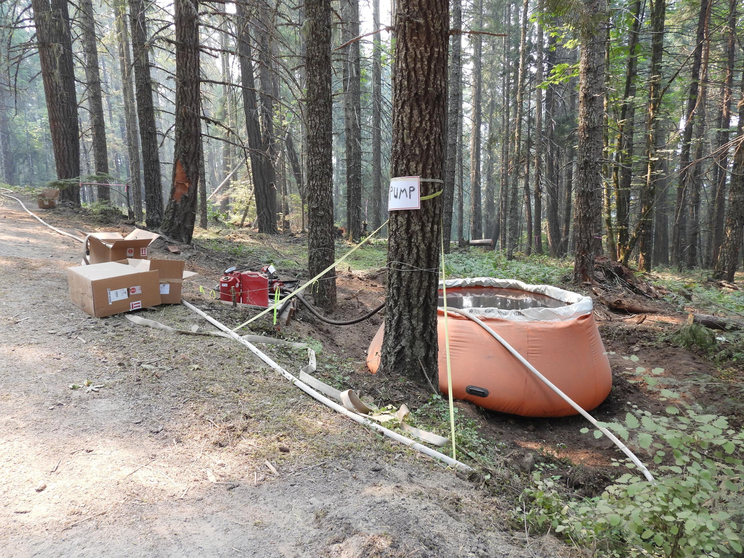 portable water tank used by fire hoses on coffepot fire july 30