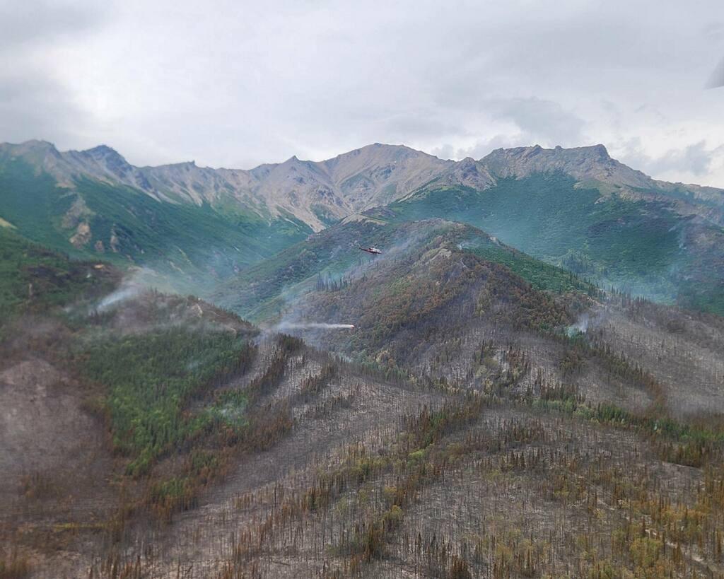 A burn pattern on the landscape with burned area, partially burned areas, and unburned areas.